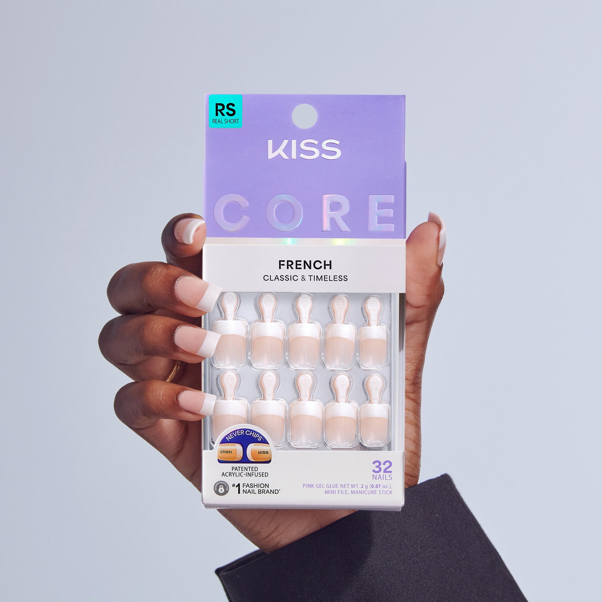 KISS Core French Classic & Timeless press-on nails, 32 count, held in hand