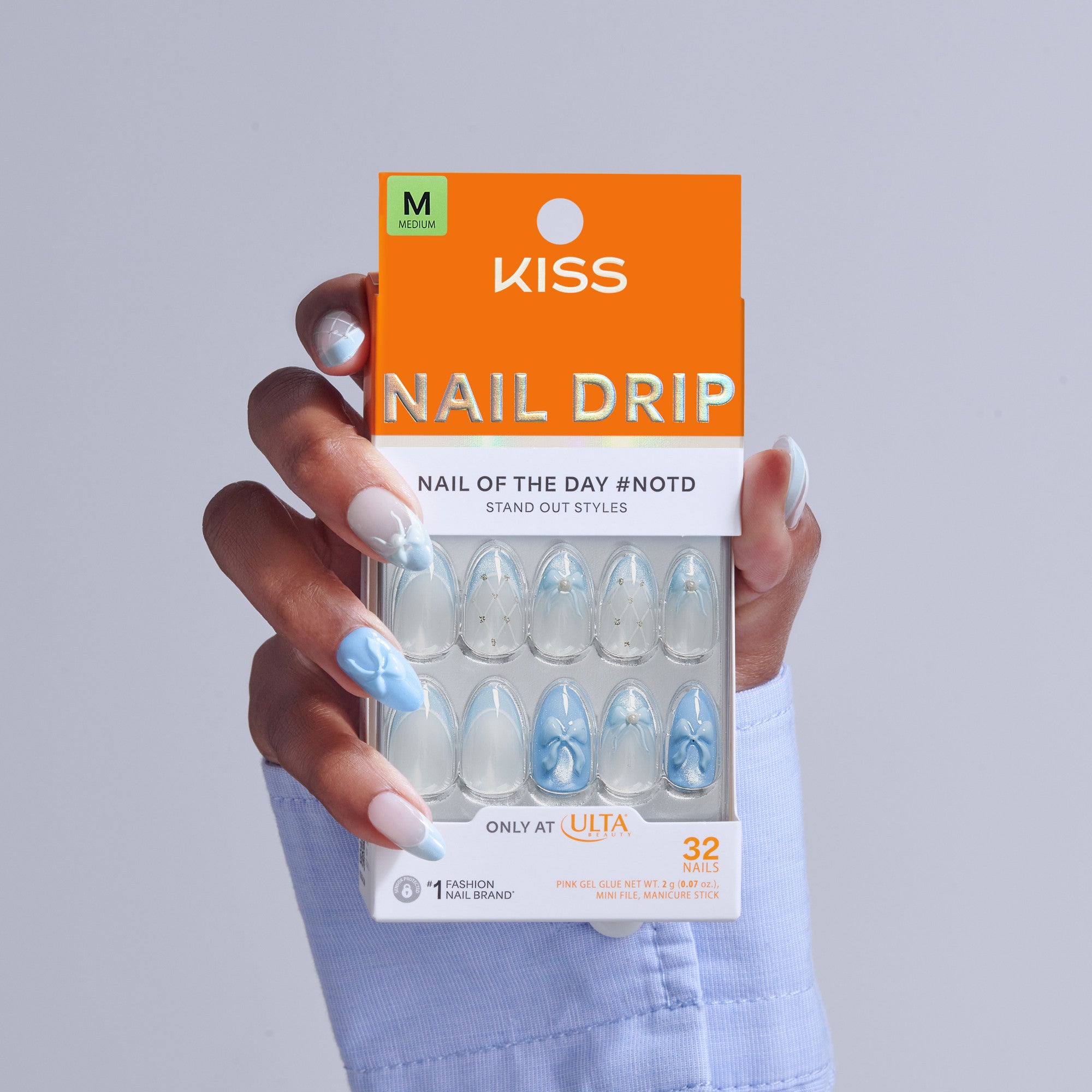 KISS Nail Drip medium size press-on nails with blue and white design, 32 count package.