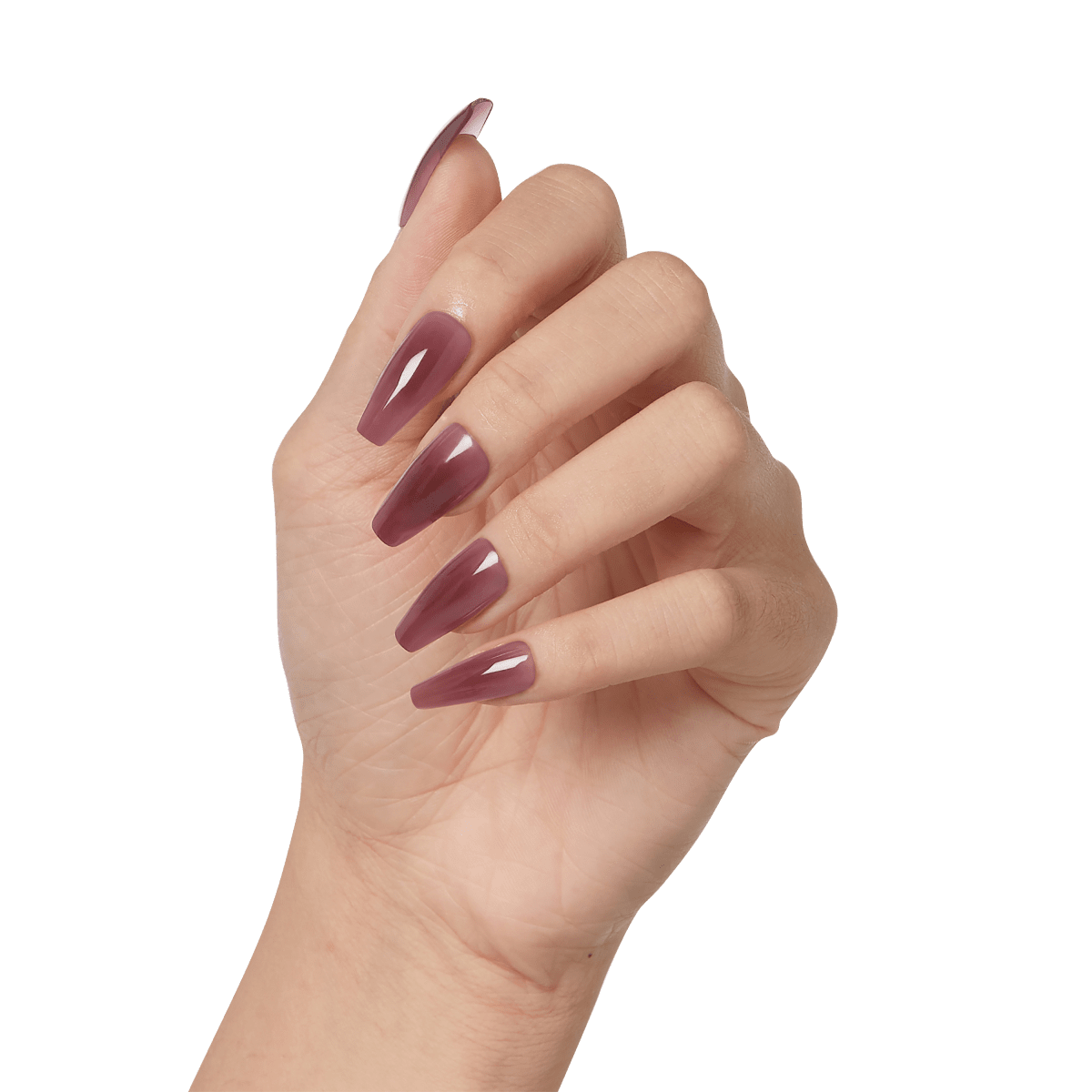 Hand showing long, coffin-shaped nails painted with glossy muted mauve color from the KISS Salon X-tend LED Soft Gel Starter Kit System in Fiat shade.