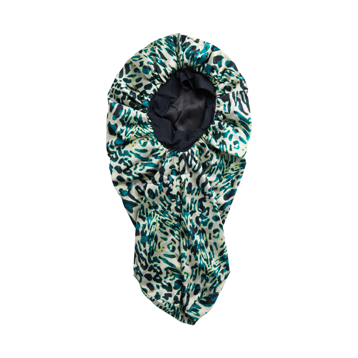 Reversible braid bonnet with crepe satin fabric featuring an exotic leopard print in teal, black, and beige, shown inside-out to display smooth black lining.