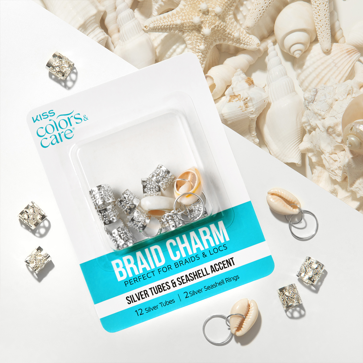 KISS Colors & Care braid charm pack featuring 12 silver tubes and 2 silver seashell accent rings, shown with decorative seashells in background.