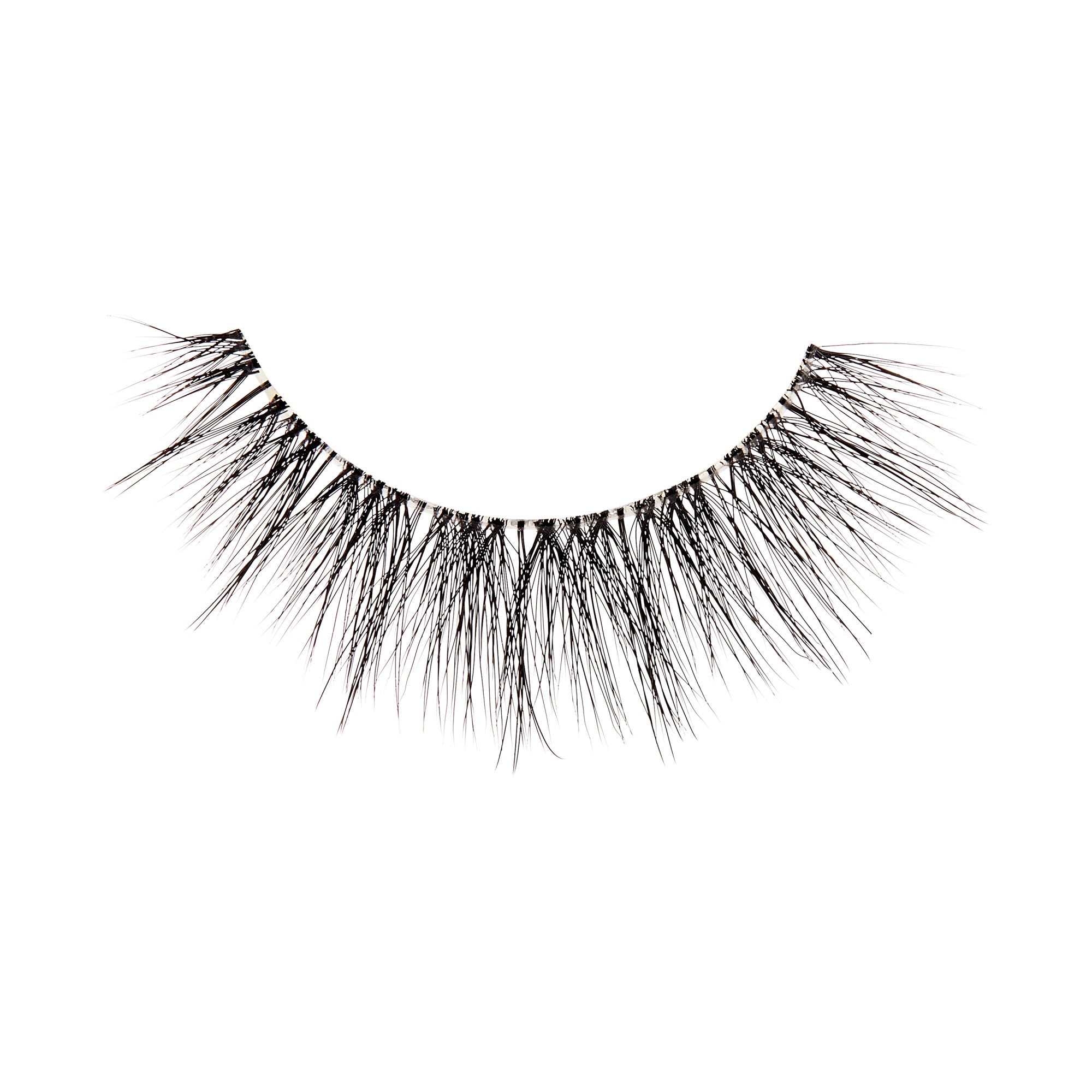 The image shows a single false eyelash. The eyelash is black and features a dense, voluminous design with varying lengths of individual lashes, creating a natural yet dramatic look. The lashes are arranged in a slightly curved shape to fit the natural contour of the eyelid. The base of the eyelash strip appears to be thin and flexible for easy application.