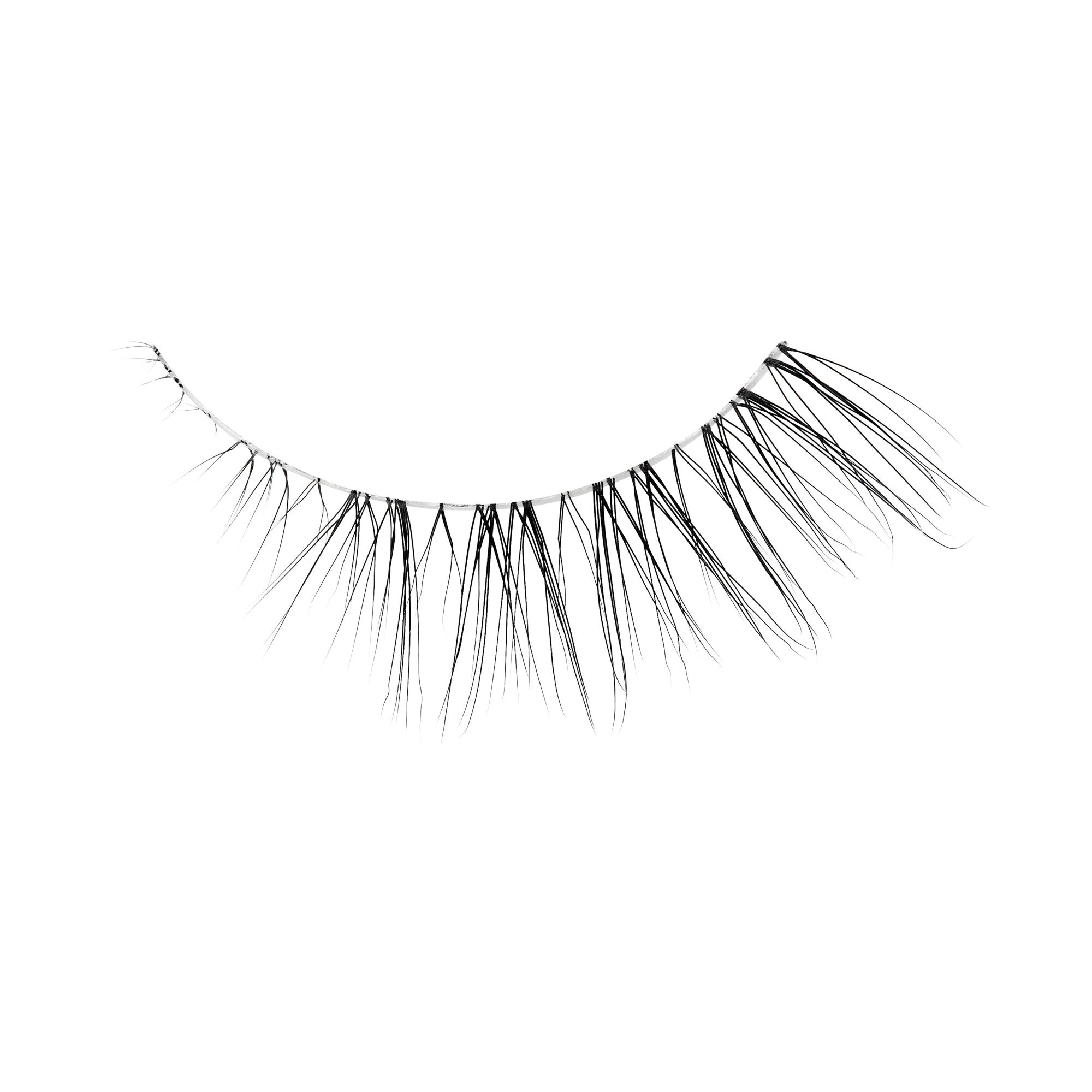 The image features a single strip of false eyelashes. The lashes are long and wispy, arranged in a curved shape to mimic the natural arch of eyelids. The strands vary in length, with some being longer and more pronounced, creating a dramatic effect. The background is plain white, emphasizing the detail and texture of the lashes.