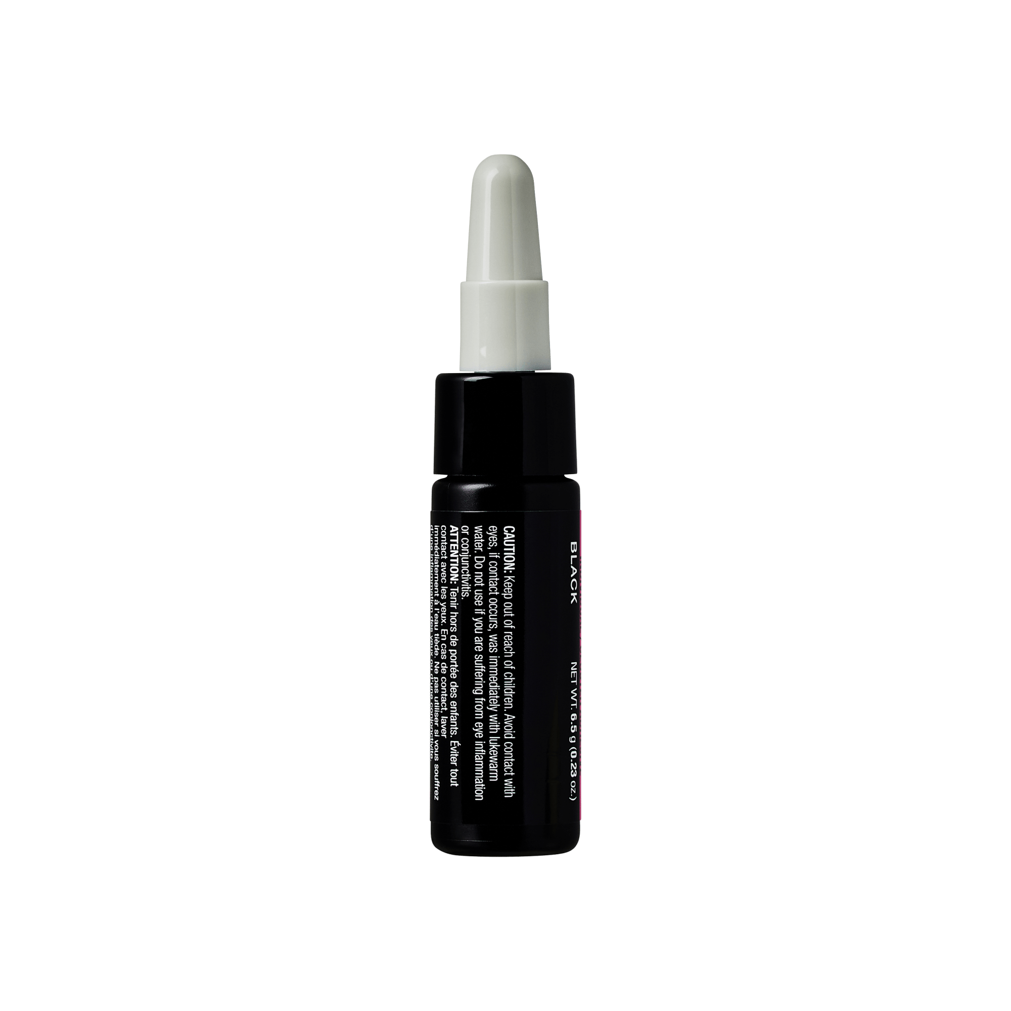 Black dropper bottle with white cap and product information label on dark background