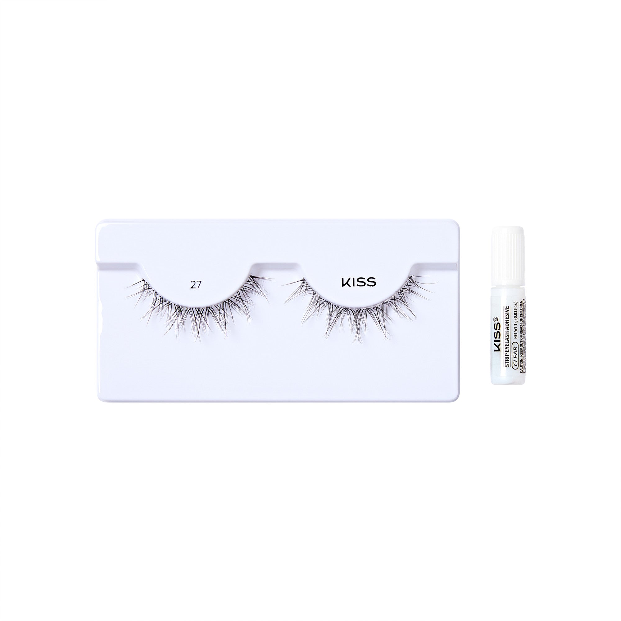 The image shows a set of false eyelashes from the brand "KISS." The eyelashes are displayed on a white tray, with the number "27" printed on the left side of the tray. To the right of the tray, there is a small tube of adhesive glue, also branded with "KISS." The overall presentation is clean and minimalistic, highlighting the eyelashes and the adhesive.