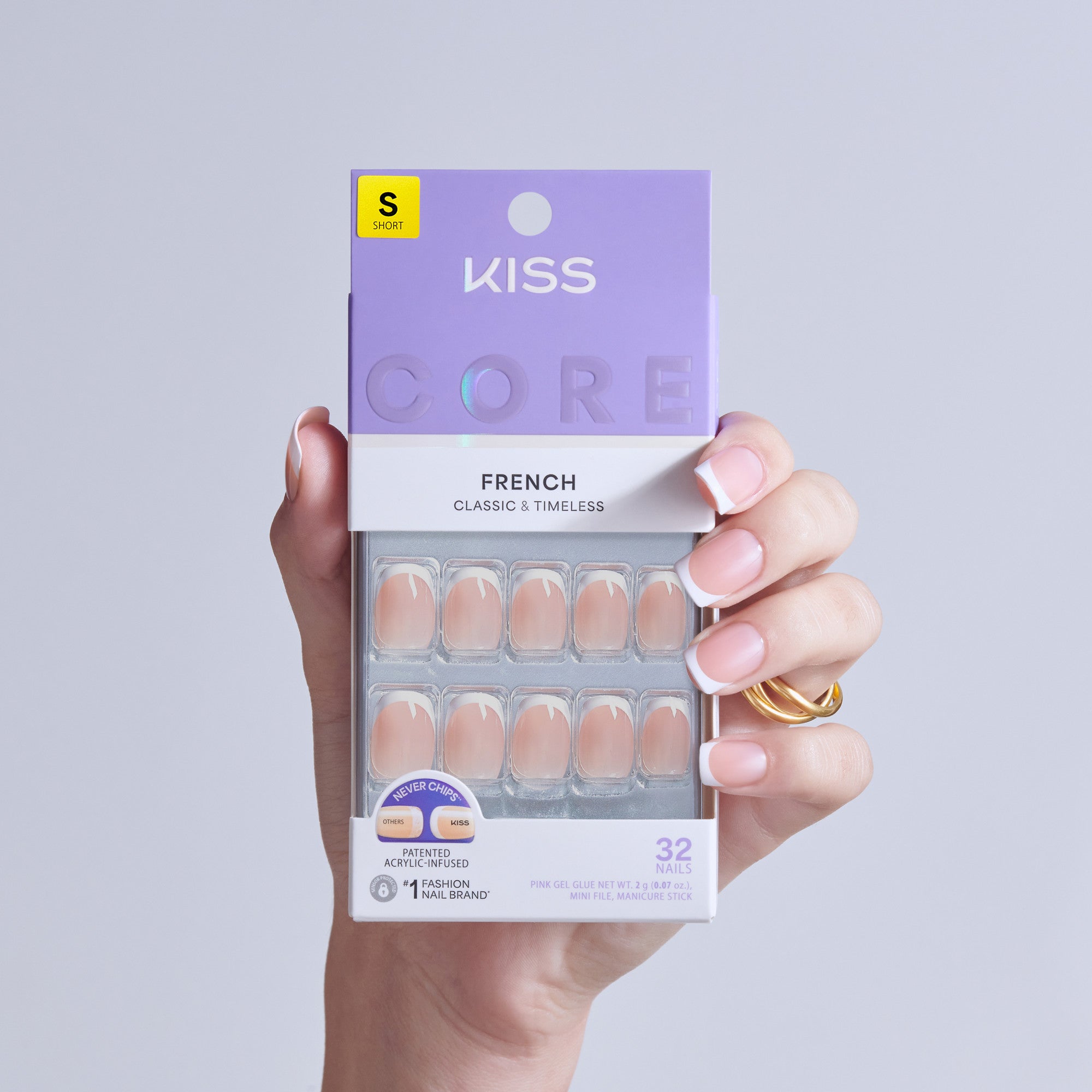 KISS Core French Classic & Timeless press-on nails in size short, displayed on hand with packaging.