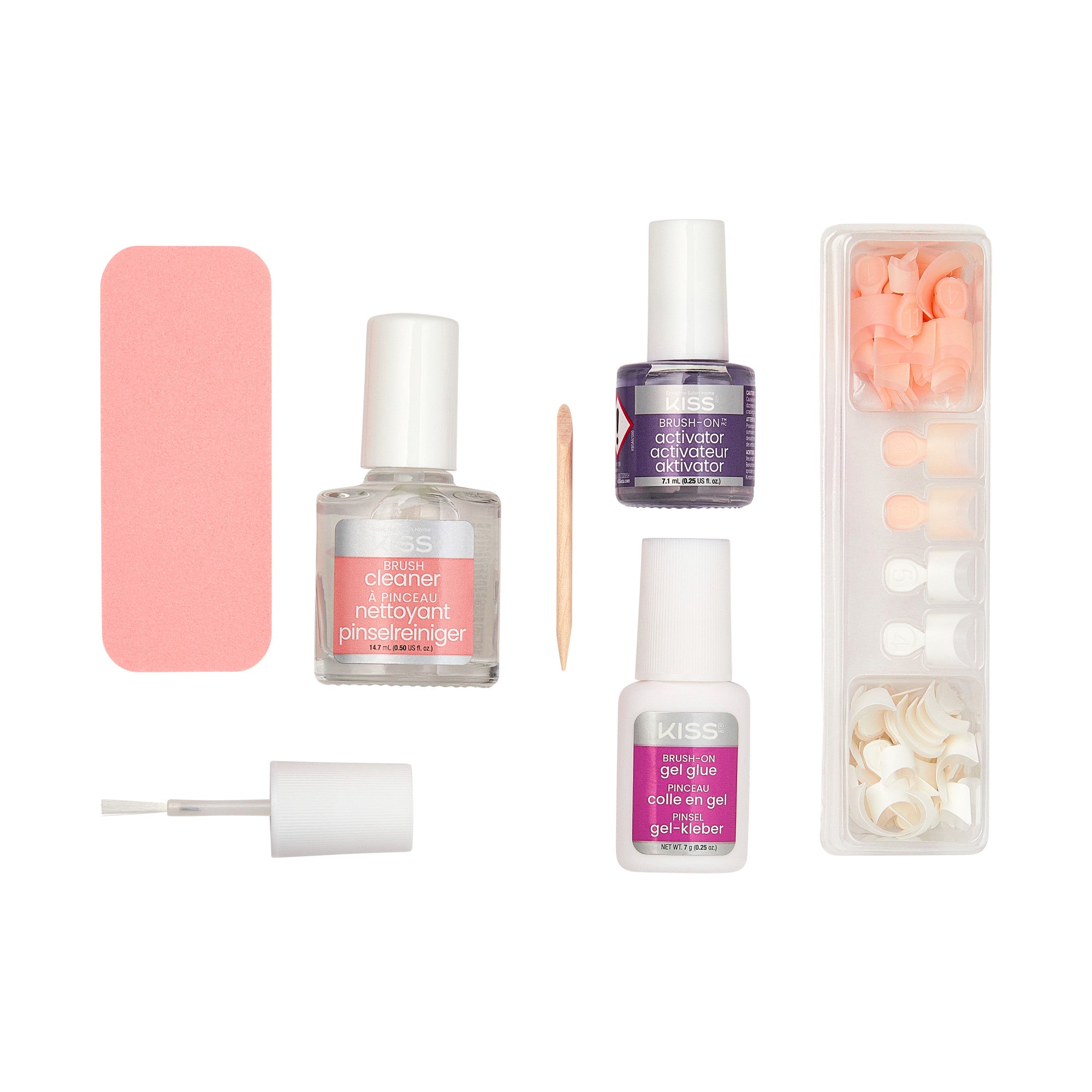 Set of KS Brush-On Gel Nail Kit items arranged on white background, including pink nail buffer, brush cleaner, wooden cuticle stick, activator, gel glue, and assorted false nail tips in peach and white.