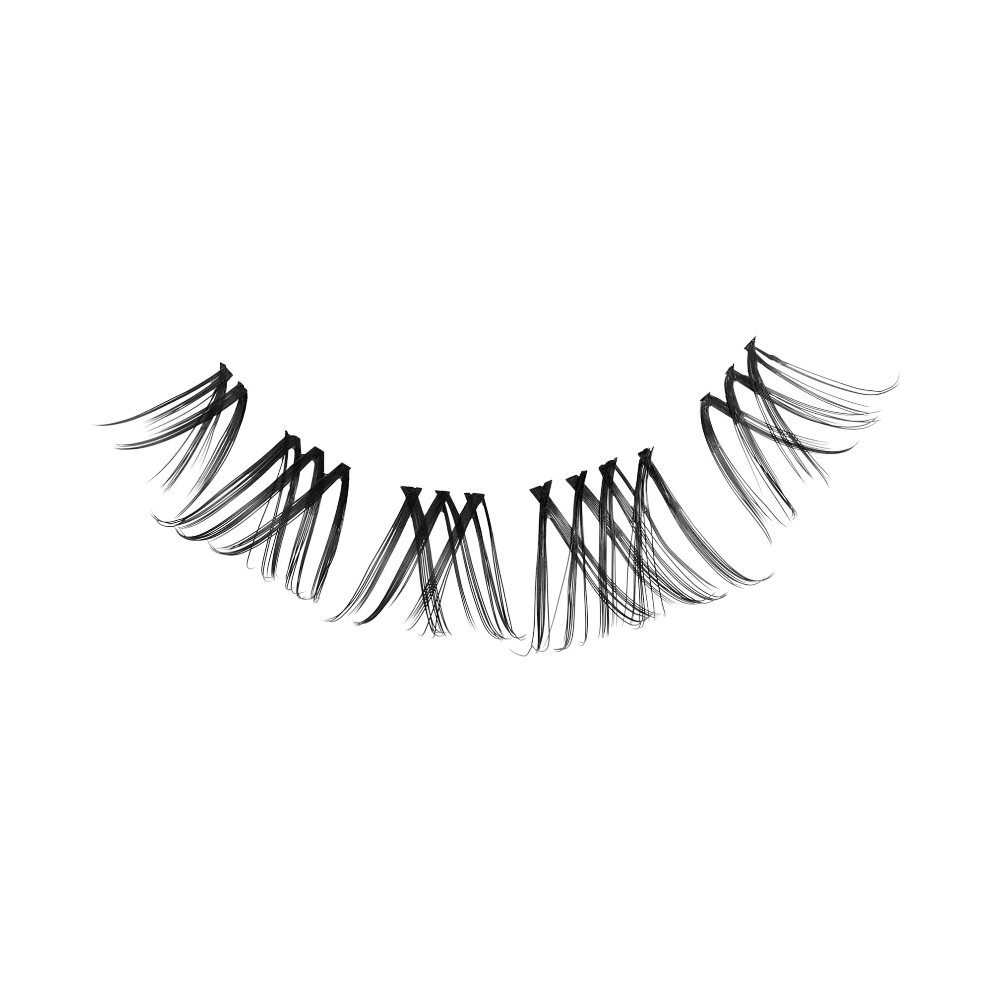 False eyelashes with layered black fibers on white background