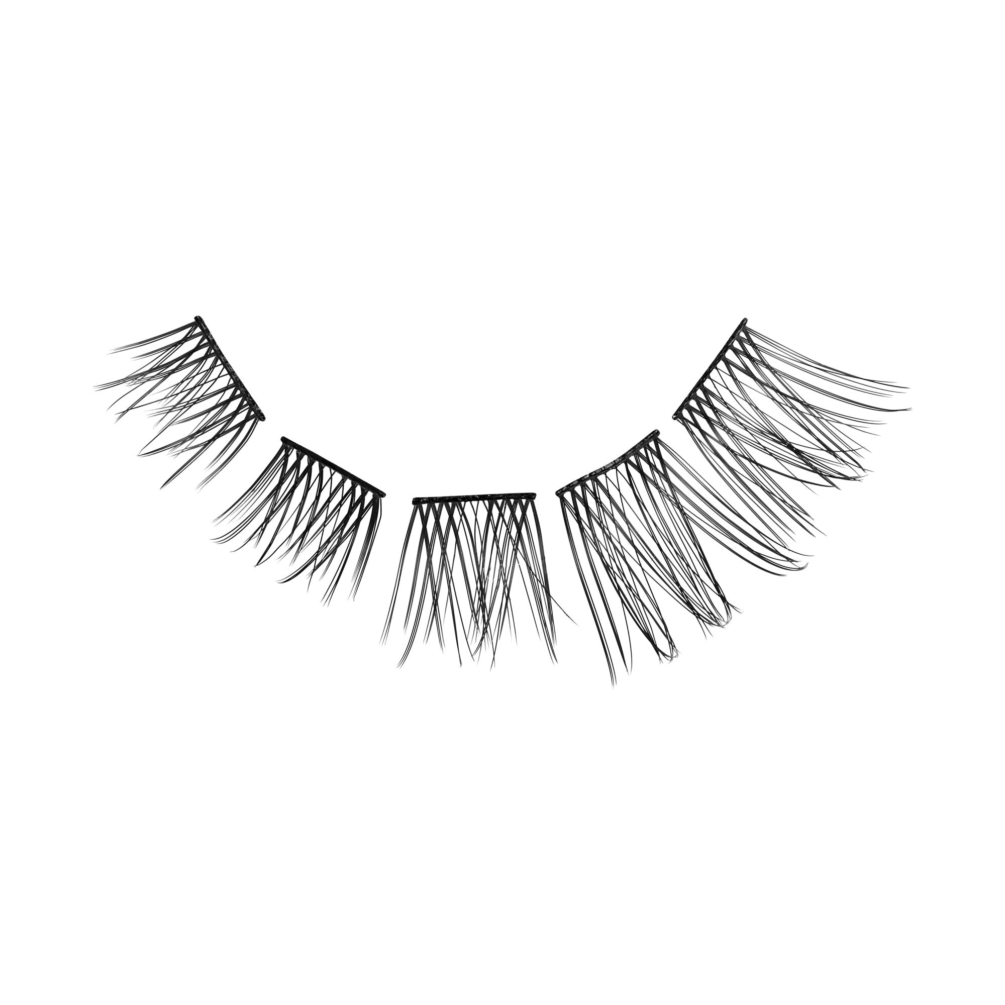 Black false eyelashes with layered, wispy design on white background.