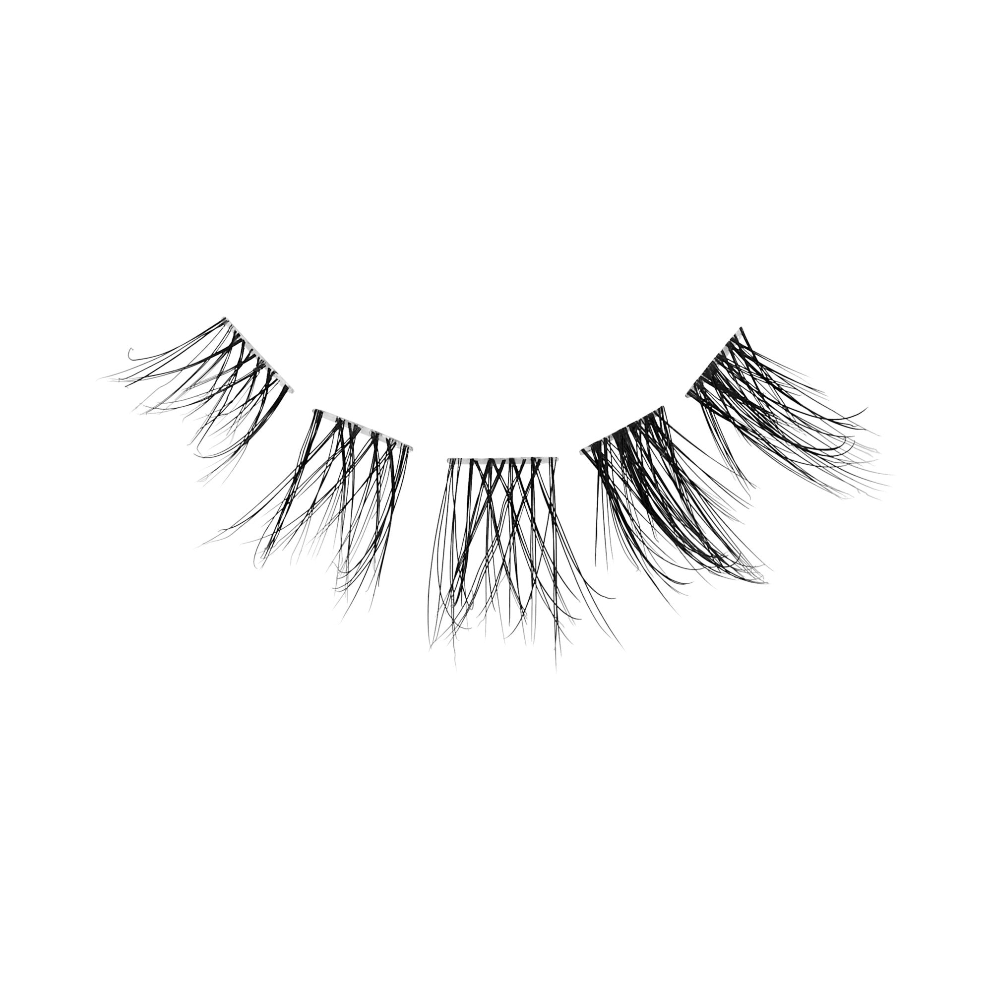 Pair of black false eyelashes with layered, wispy strands on white background.