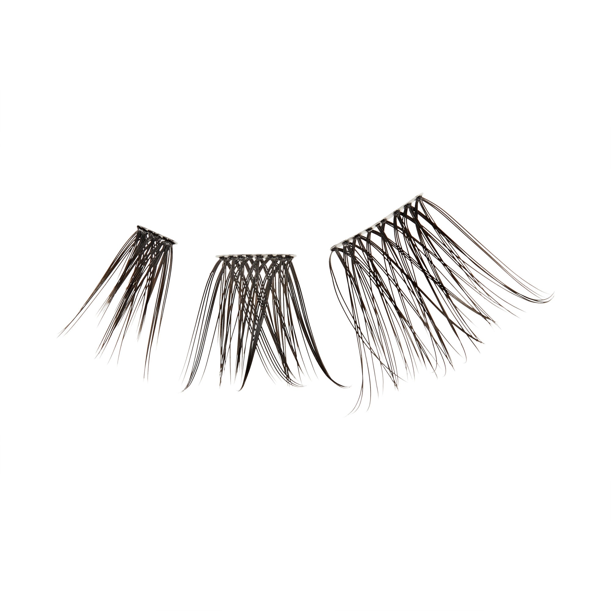 Three clusters of ultra-fine, black false lash wisps of varying lengths arranged horizontally on a white background.