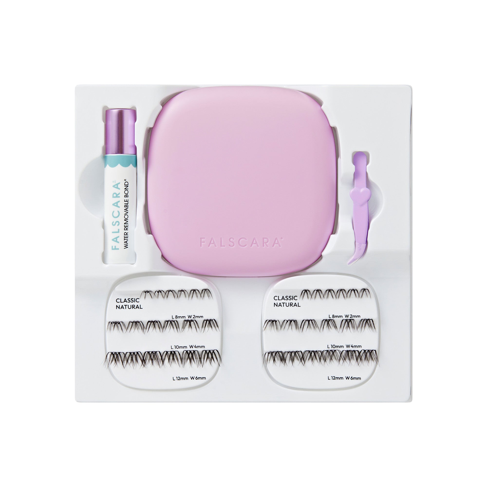 Falscara lash kit with pink case, mascara, applicator, and false lashes in multiple sizes.