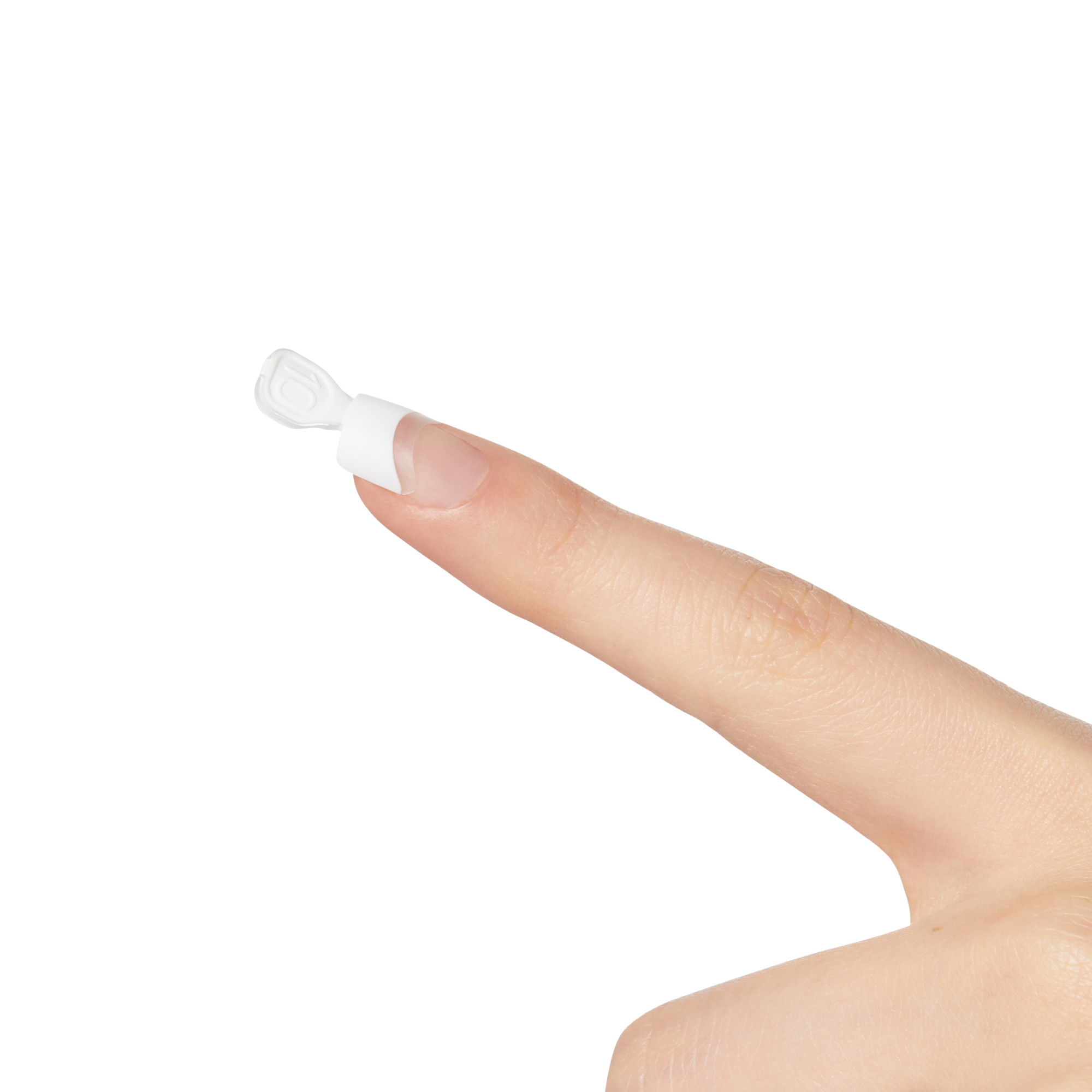 Close-up of a finger with a white plastic nail shield from the KS Brush-On Gel Nail Kit applied on the nail, showing the shield&