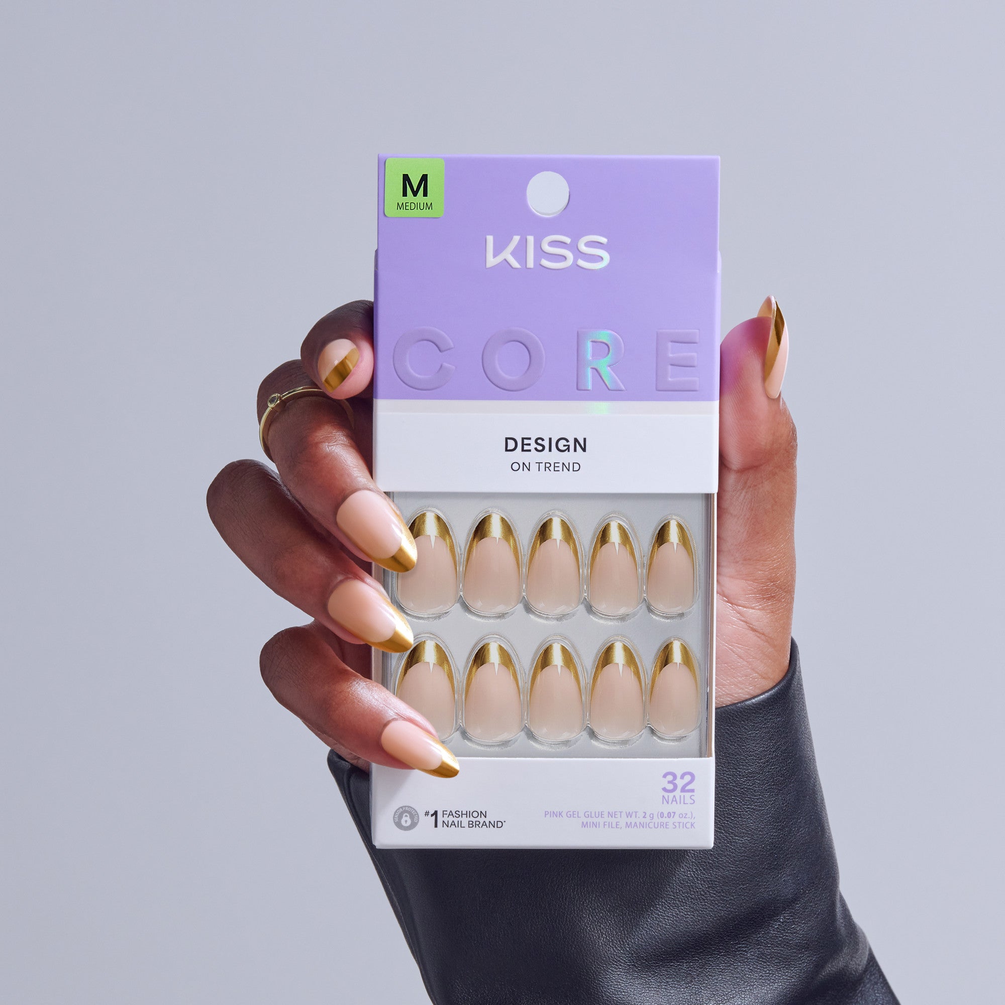 KISS Core Design On Trend press-on nails, medium size, nude with gold tips.