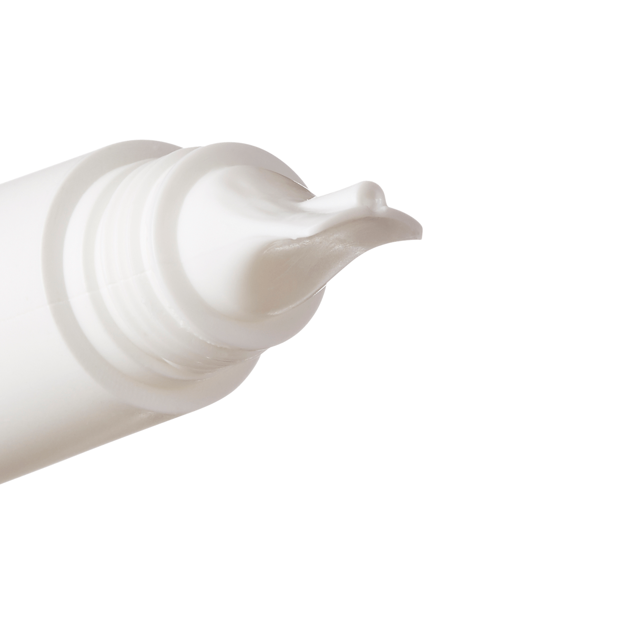 Close-up view of a white tube applicator dispensing white cream, showing the creamy texture of KISS Glue OFF Press On Nails Remover.