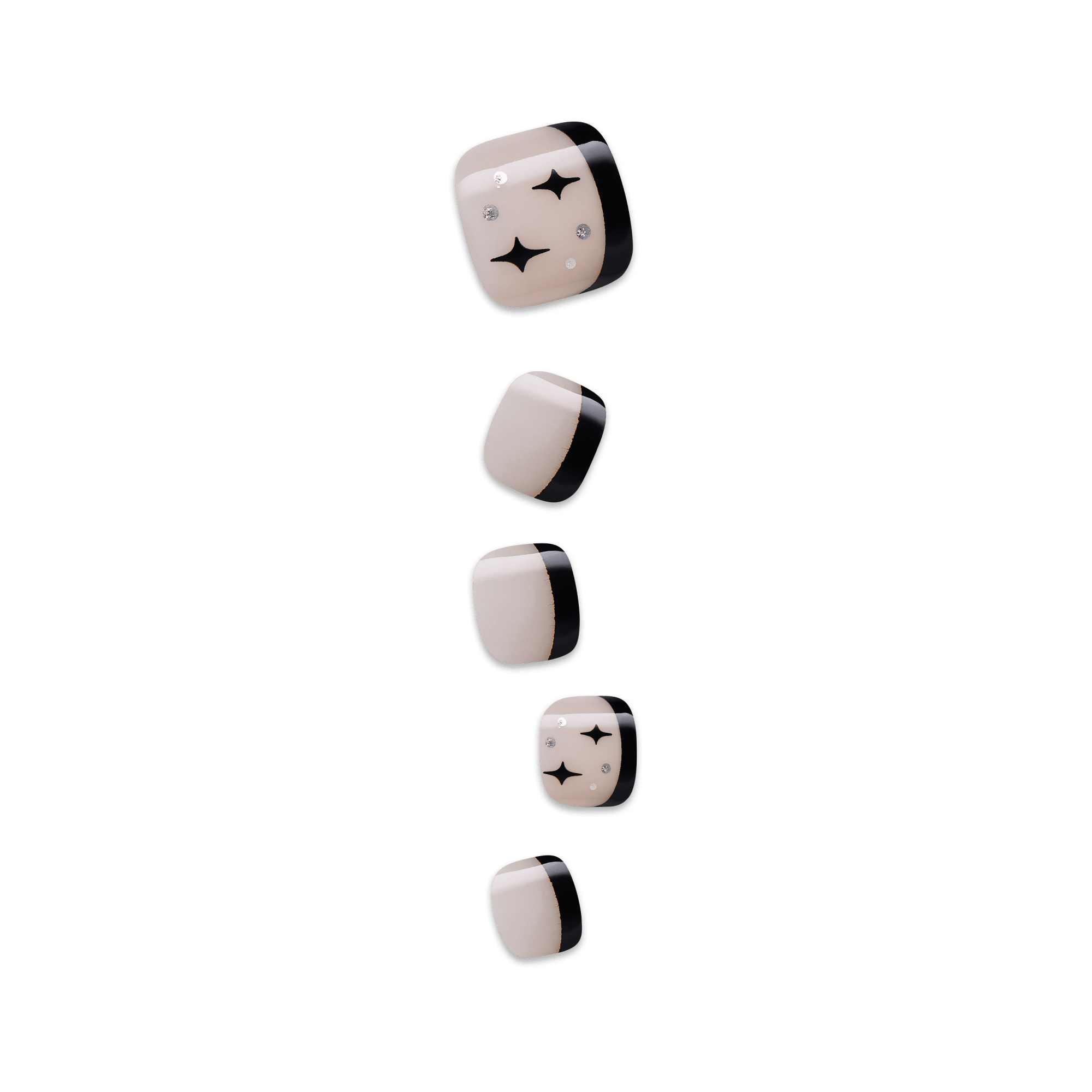 Set of five press-on toenails with a beige base, black tips, and black star and silver dot accents on the largest and second smallest nails.