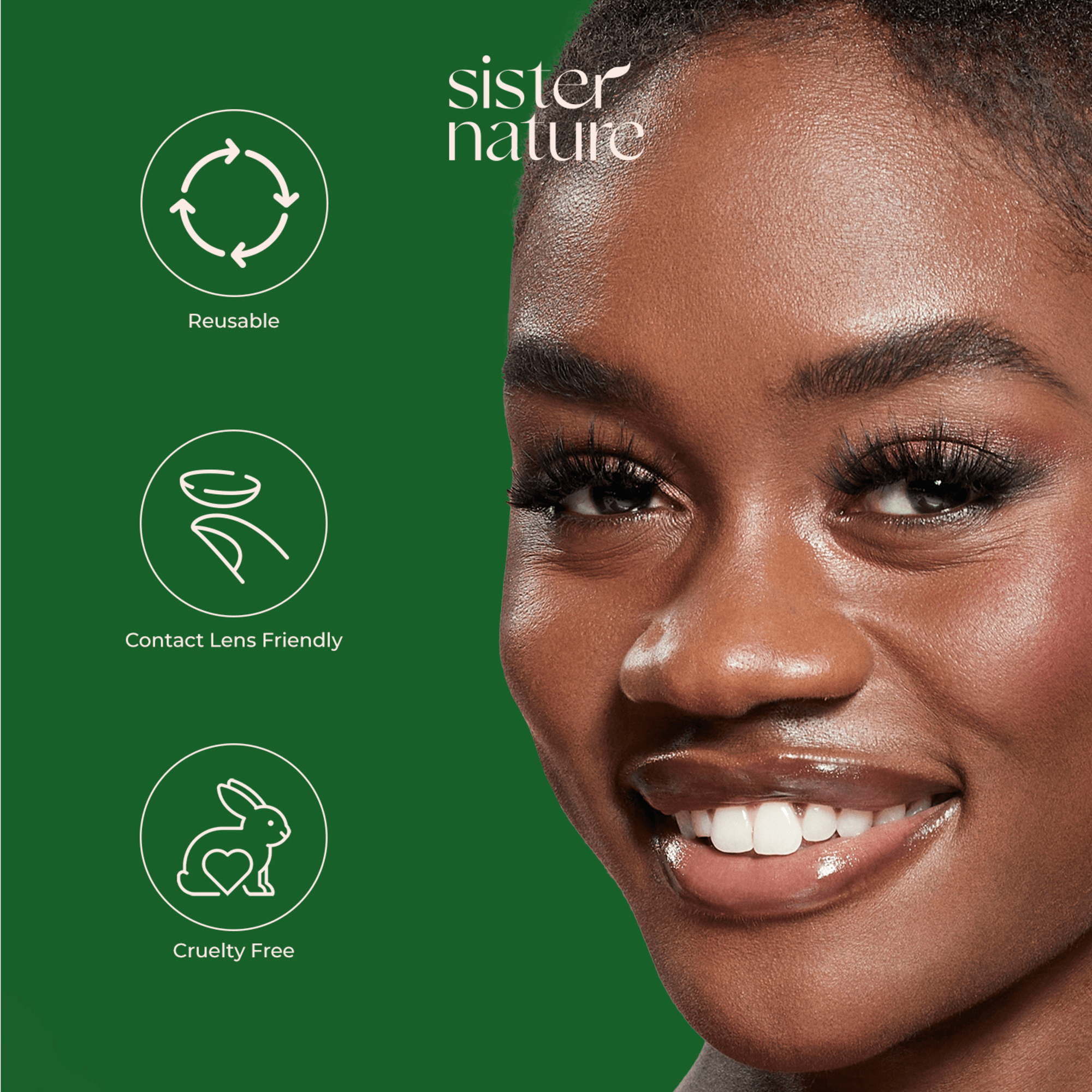 Close-up of a smiling woman with long lashes on a green background. Text highlights the product as reusable, contact lens friendly, and cruelty-free under the brand \