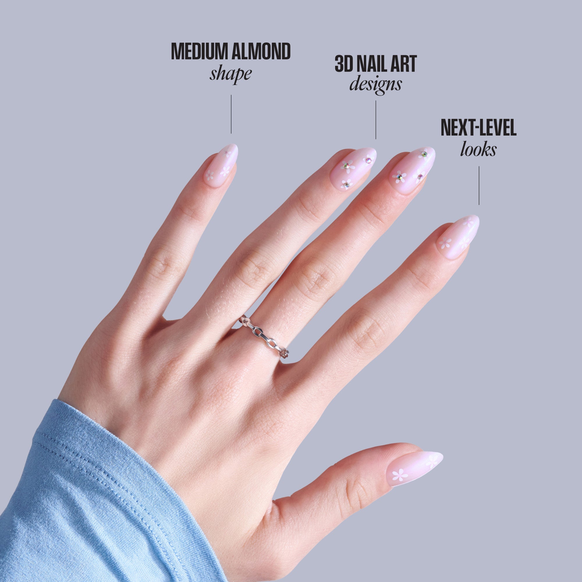 Medium almond acrylic nails with 3D nail art designs and pink ombre finish