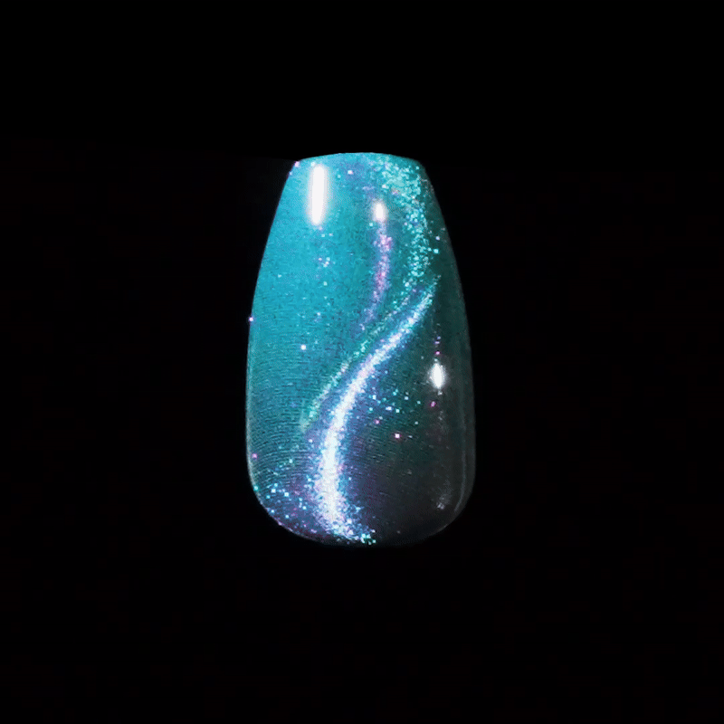 Single press-on nail with shimmering teal color and iridescent glitter swirl, shown against a black background with glossy finish.