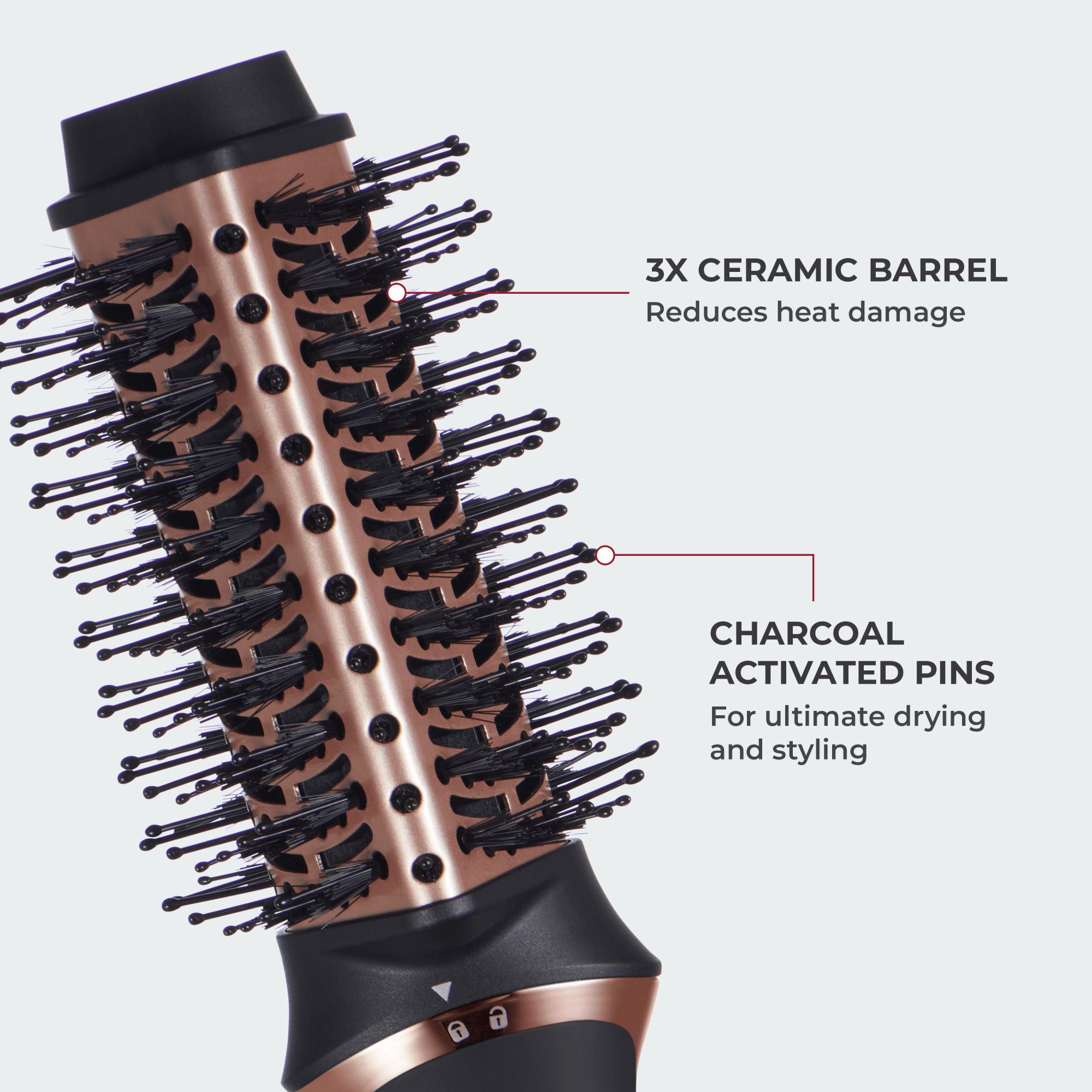 Round hairbrush with a copper-colored ceramic barrel and black charcoal-activated pins, labeled for heat damage reduction and ultimate drying and styling.