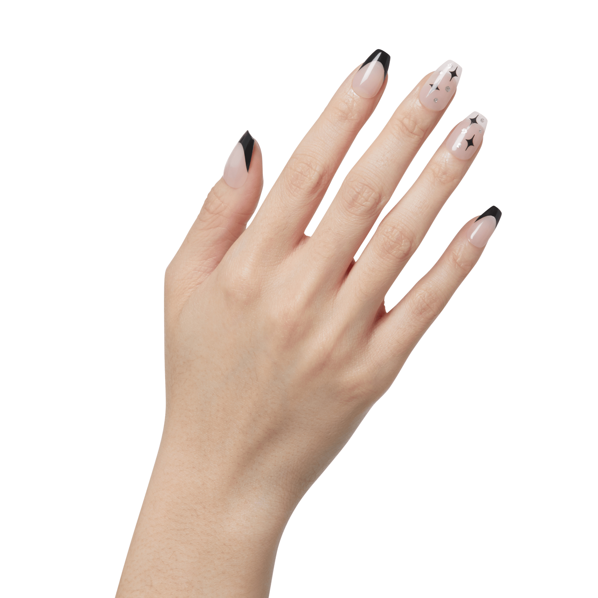 Hand with press-on nails featuring a nude base, black diagonal tips on the thumb, index, and pinky, and star designs on the middle and ring fingers.