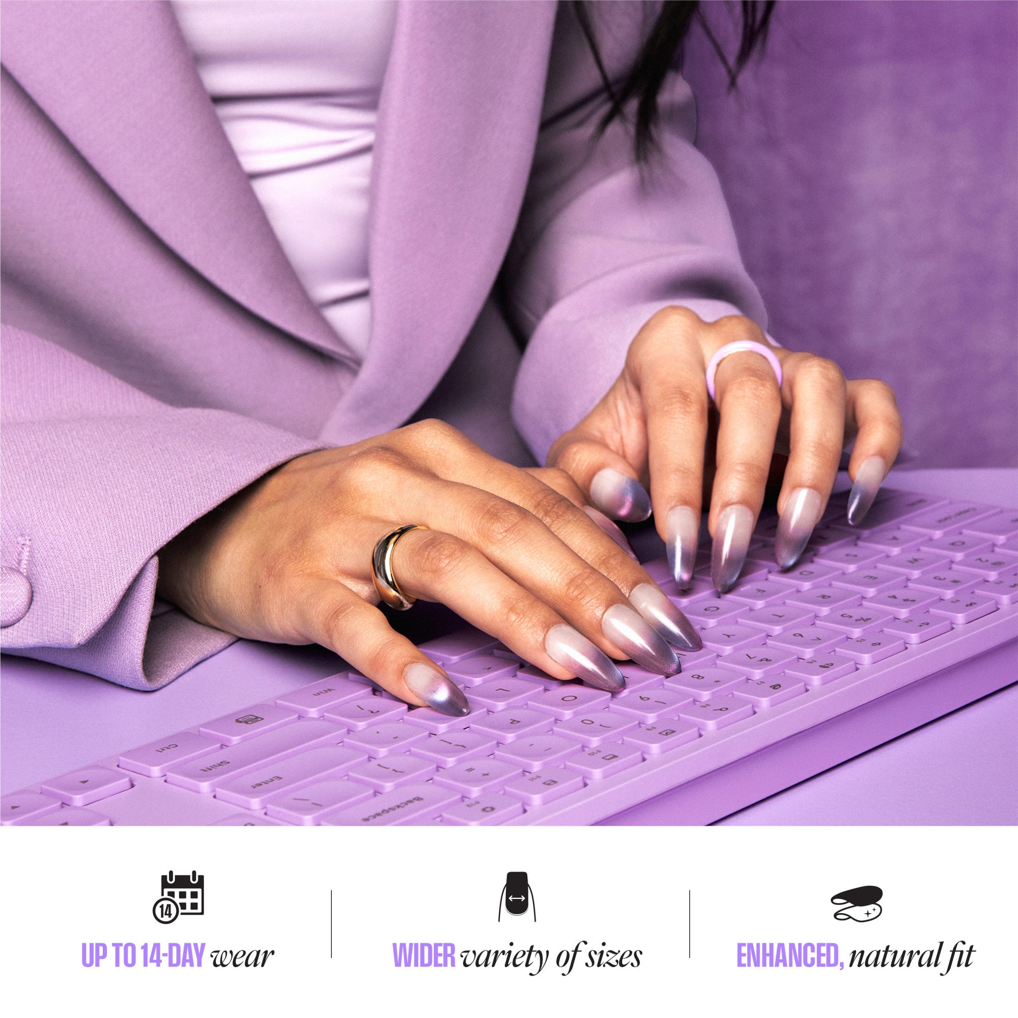 Hands typing on purple keyboard, wearing metallic nails and ring. "Up to 14-day wear" text below.