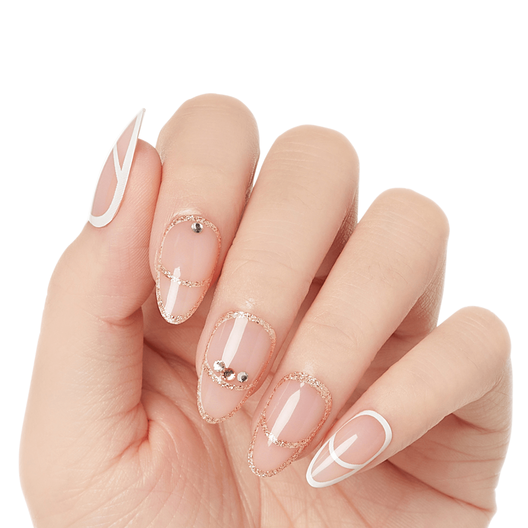 Hand with press-on nails featuring a nude base, rose gold glitter lines, silver rhinestones on middle nails, and white geometric designs on thumb and pinky.