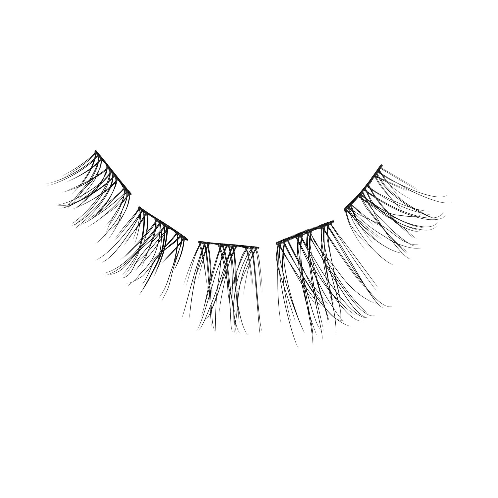 False eyelashes with wispy, layered strands in black on white background.