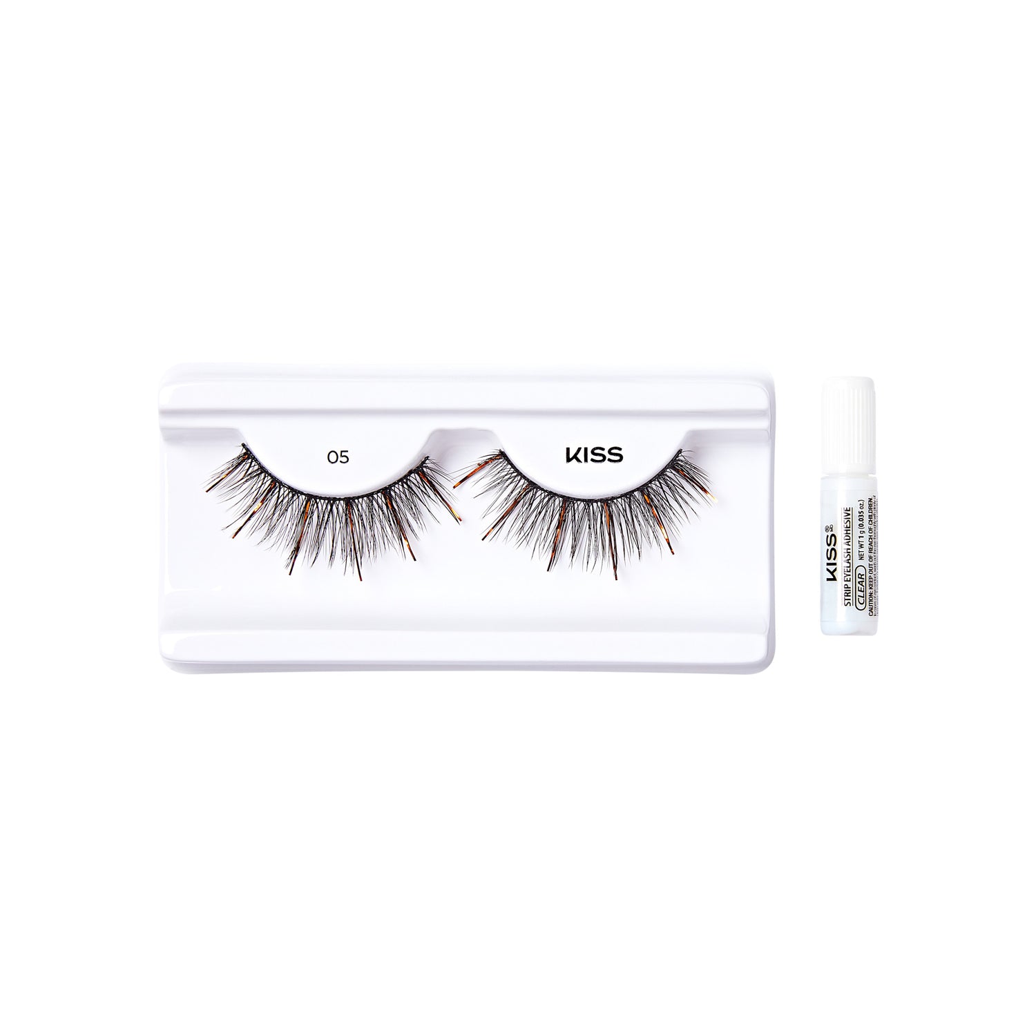 The image shows a set of false eyelashes from the brand "KISS." The eyelashes are displayed on a white plastic tray, with the number "05" printed on the left side of the tray. The tray holds a pair of voluminous, multi-layered lashes that appear to be designed for a dramatic look. To the right of the tray, there is a small white tube of adhesive, also branded with "KISS," which is used to apply the false eyelashes. The overall presentation is clean and minimalistic, highlighting the product.