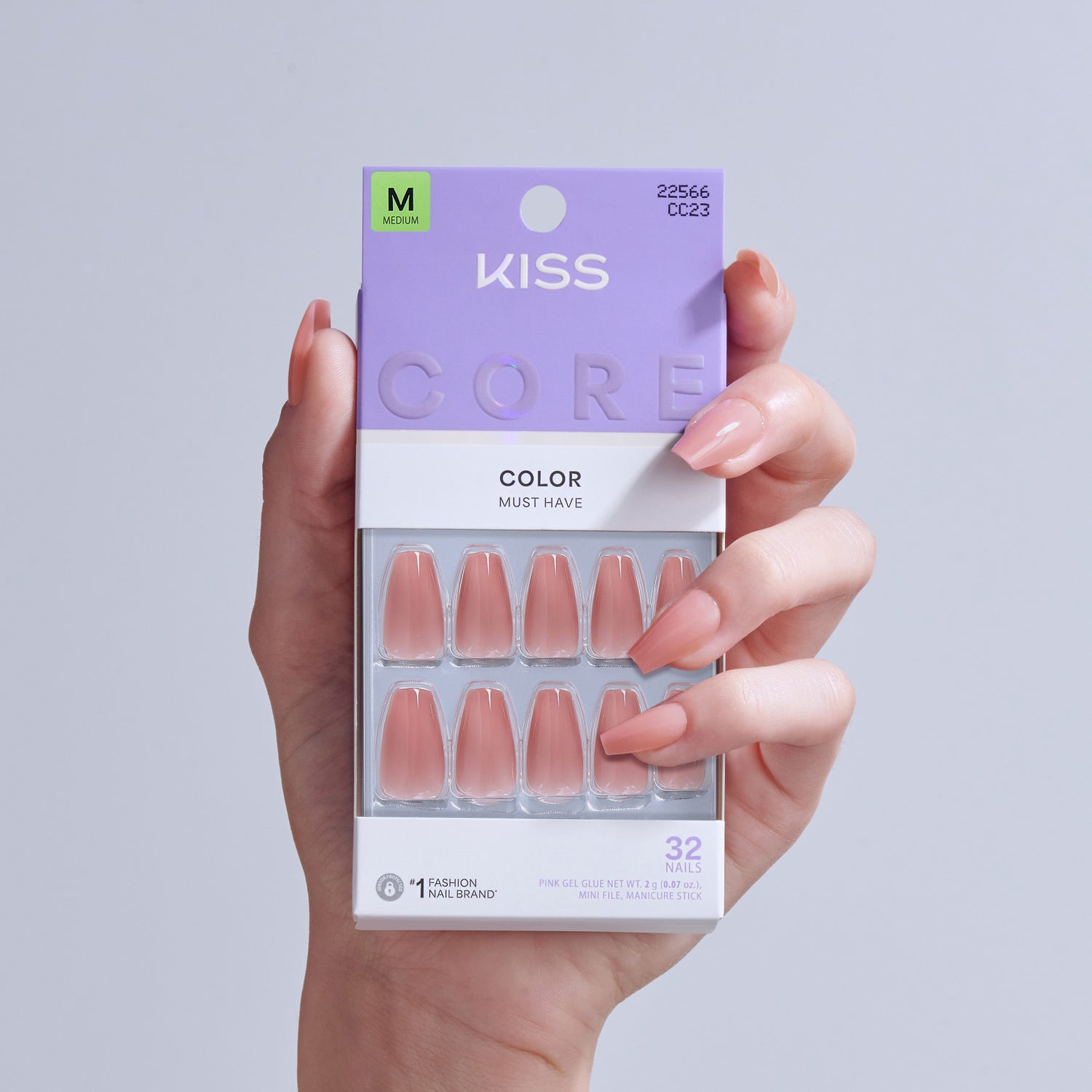 KISS Core Color Must Have press-on nails in pink, size M, 32 nails displayed in packaging.