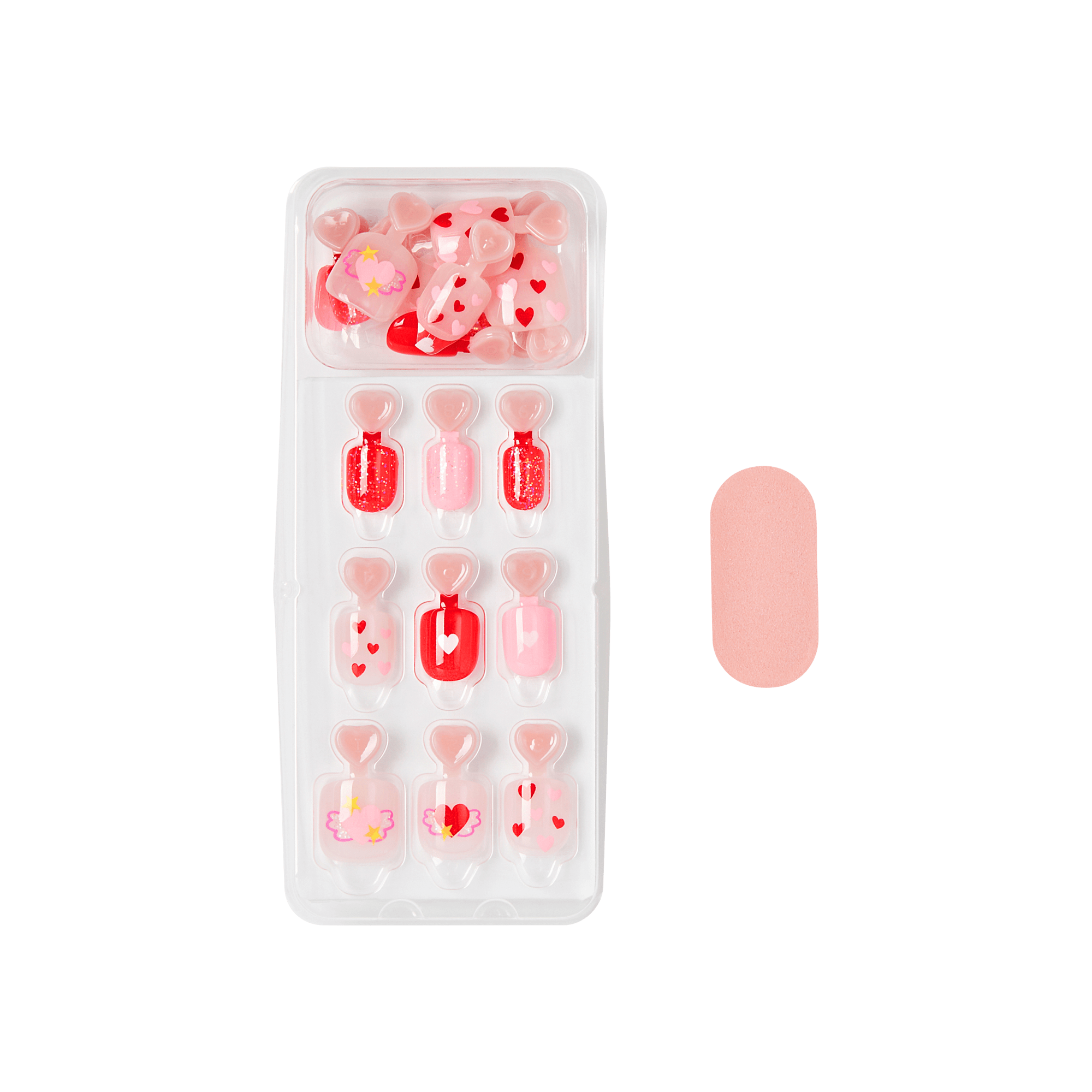 Press-on nail set with heart designs in pink and red shades with loose decorative elements.