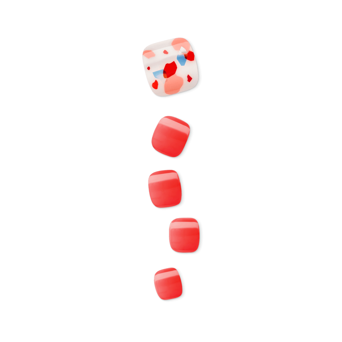 Set of five square-shaped press-on pedicure nails in shades of coral red; one nail features a terrazzo pattern with red, pink, and blue accents.