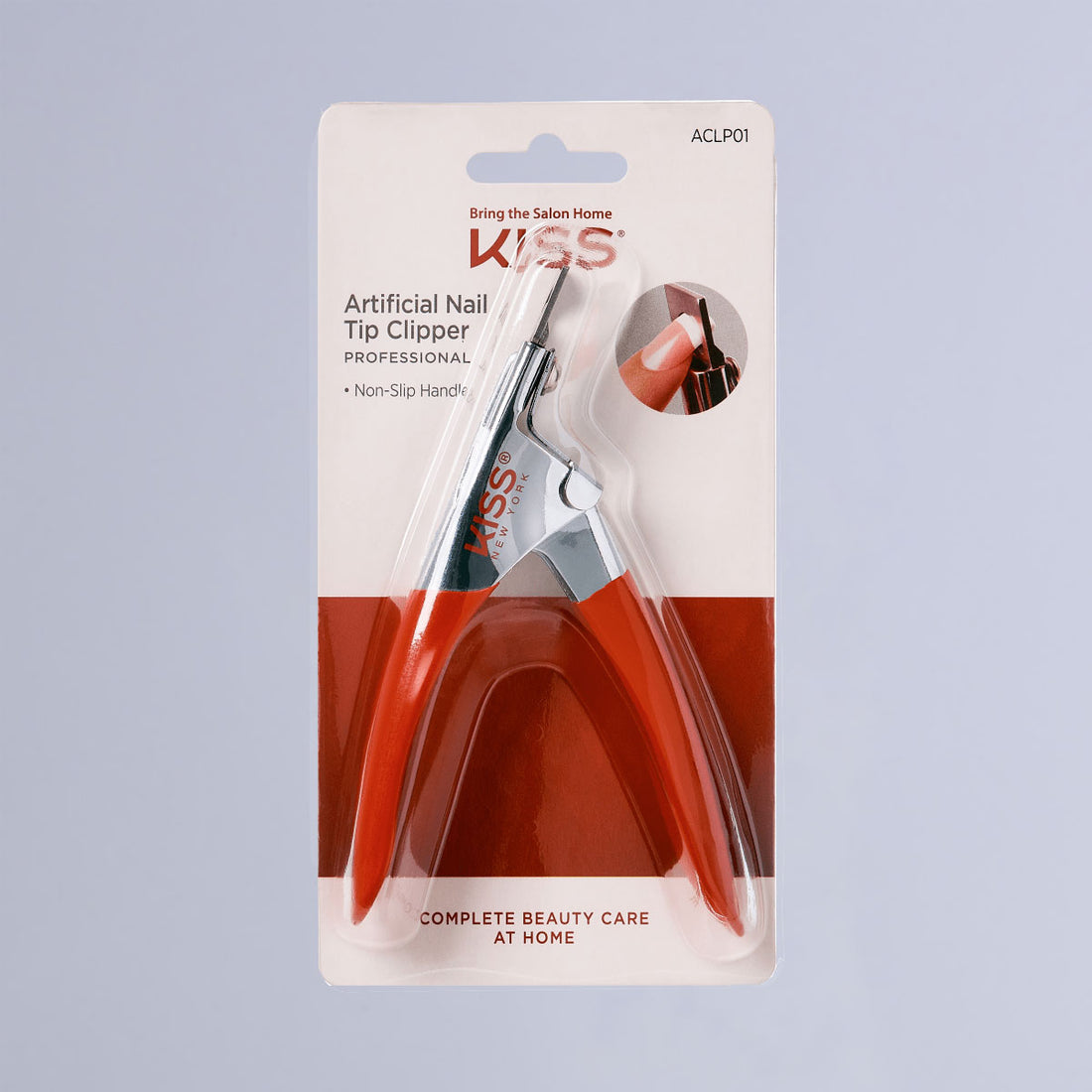 KISS Artificial Nail Tip Clipper with red non-slip handles in clear blister packaging, featuring \