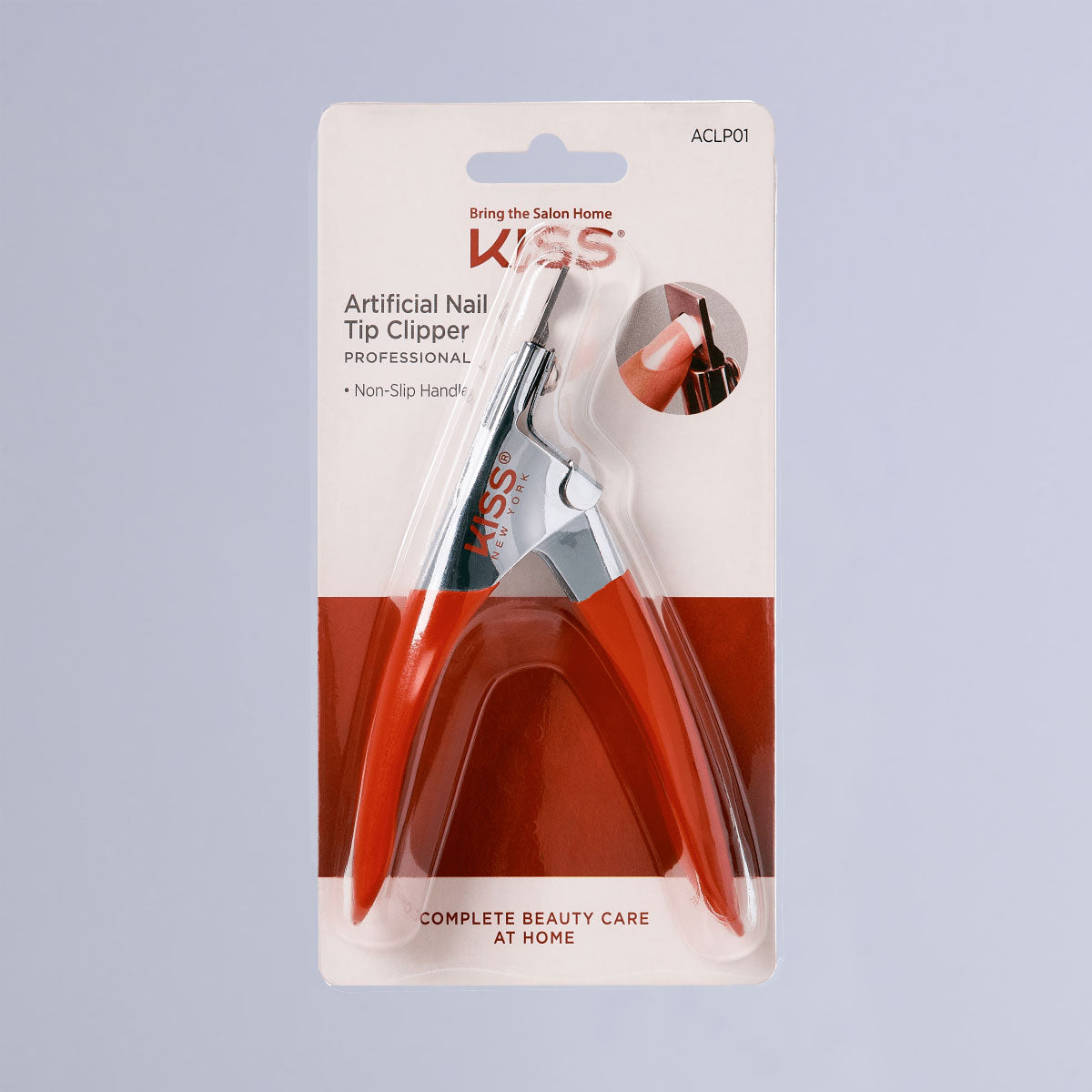KISS Artificial Nail Tip Clipper with red non-slip handles in clear blister packaging, featuring \