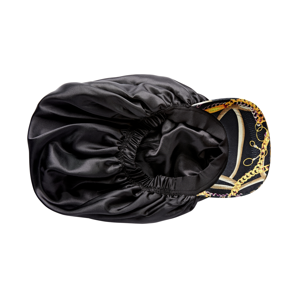 Black silky satin bonnet cap with an elastic opening and a printed visor featuring gold chain and rope patterns, shown from above.