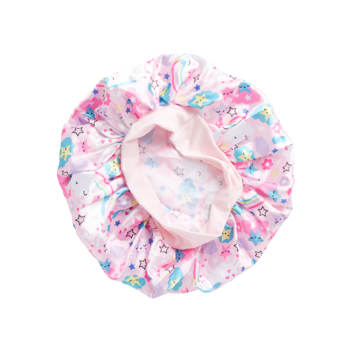Toddler-sized silky satin bonnet in light pink with colorful smiling clouds, stars, rainbows, and hearts pattern, shown flat from above.