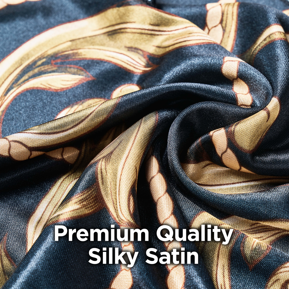 Close-up view of black and gold patterned silky satin fabric with a swirl fold, overlaid with the text \