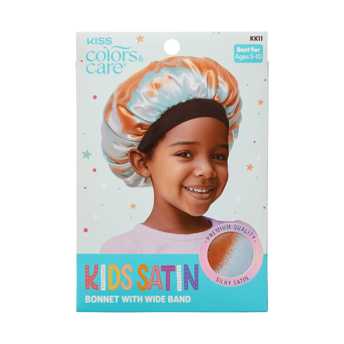 Smiling child wearing a tie-dye orange and blue satin bonnet with a black wide band, shown on KISS Colors &amp; Care packaging for ages 5-10.