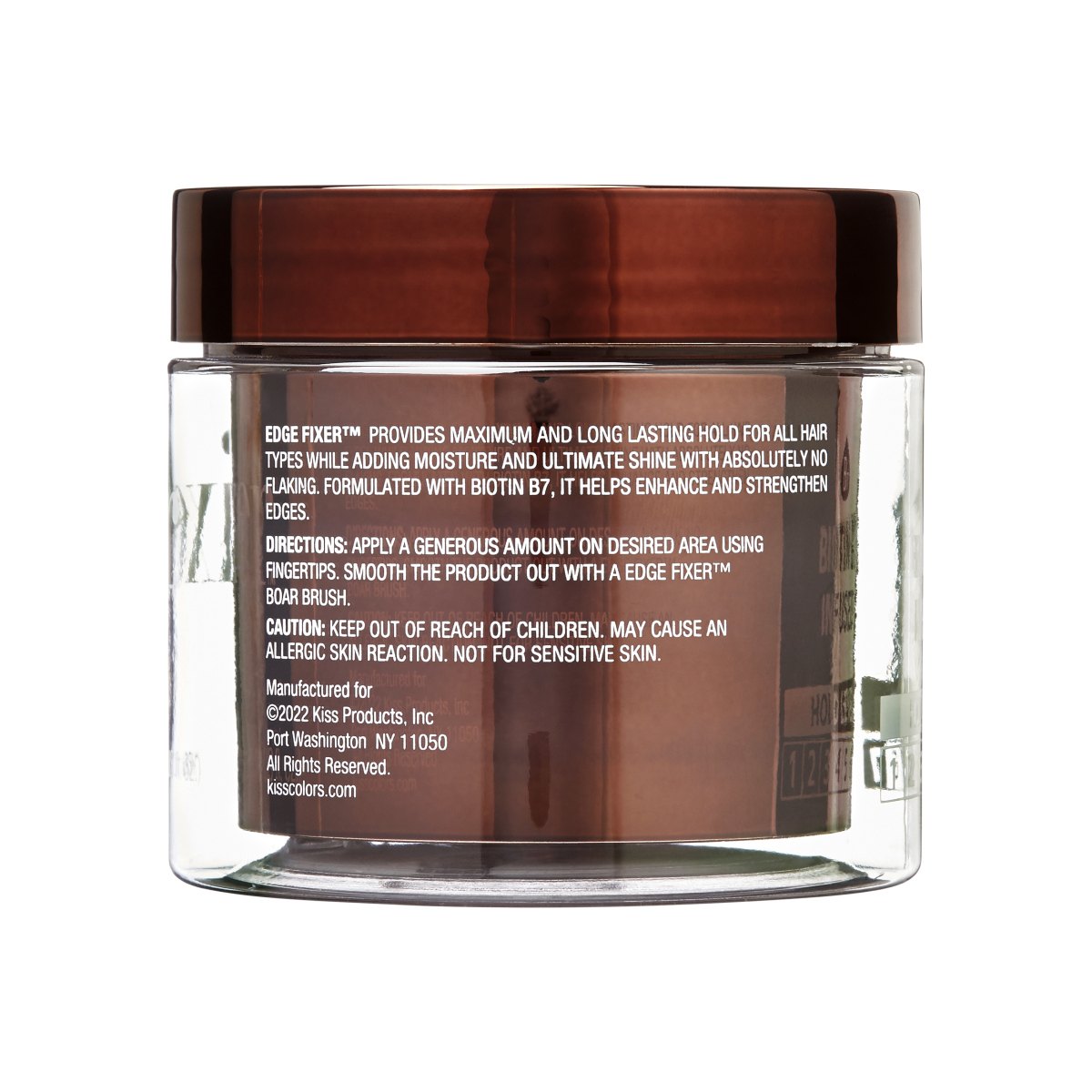 Clear round container with a brown lid showing product label text about edge fixer providing long-lasting hold, moisture, shine, and biotin B7 benefits.