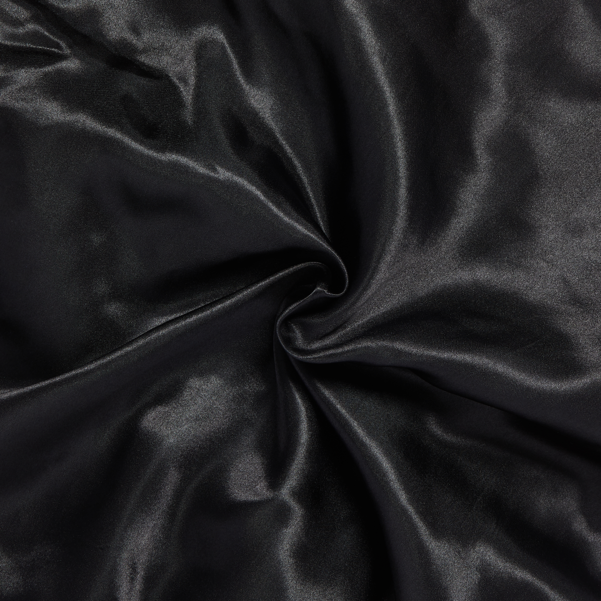 Black silky satin fabric with a smooth, shiny texture twisted in the center, representing the material used in the KISS Colors &amp; Care Silky Satin Double Wear Cap.
