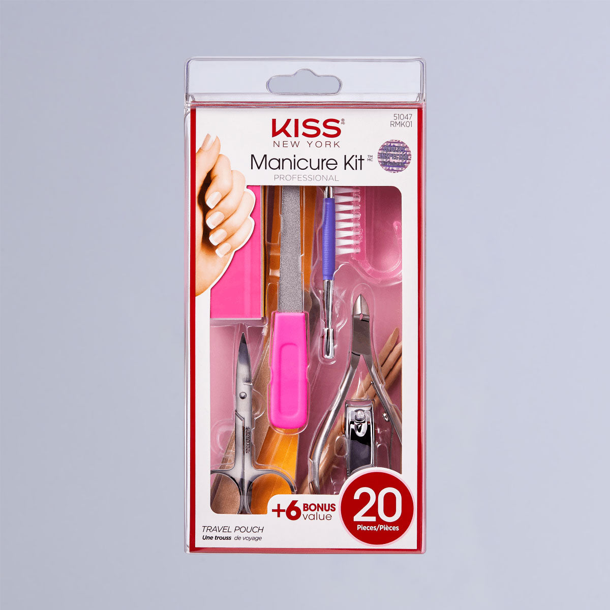 KISS New York professional manicure kit with 20 pieces including scissors, nail clippers, file, brush, and cuticle tools in clear plastic packaging with pink accents.