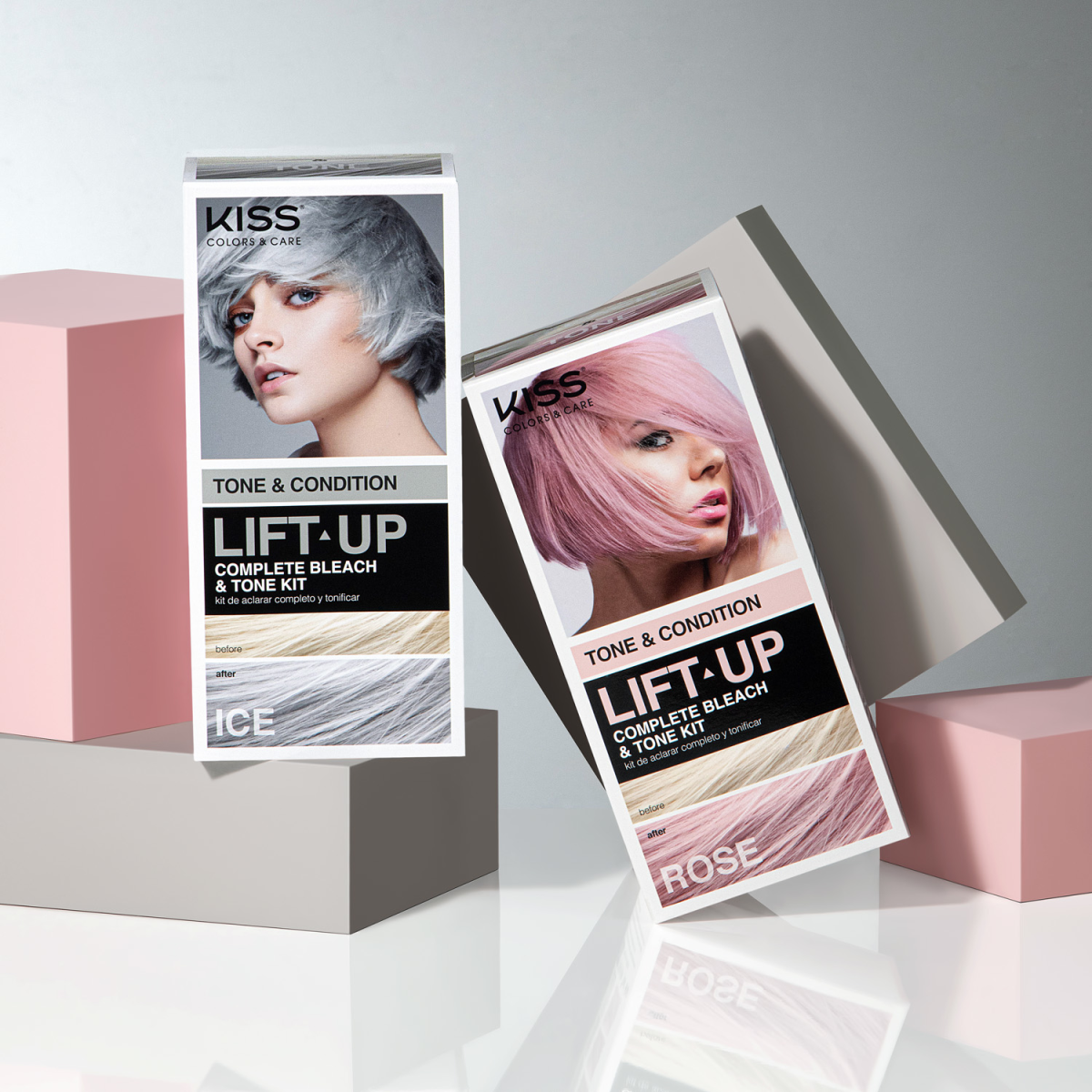 Two KISS Colors &amp; Care Lift-Up Complete Bleach &amp; Tone Kit boxes side by side, showing before and after hair color results—Ice silver on left, Rose pink on right.