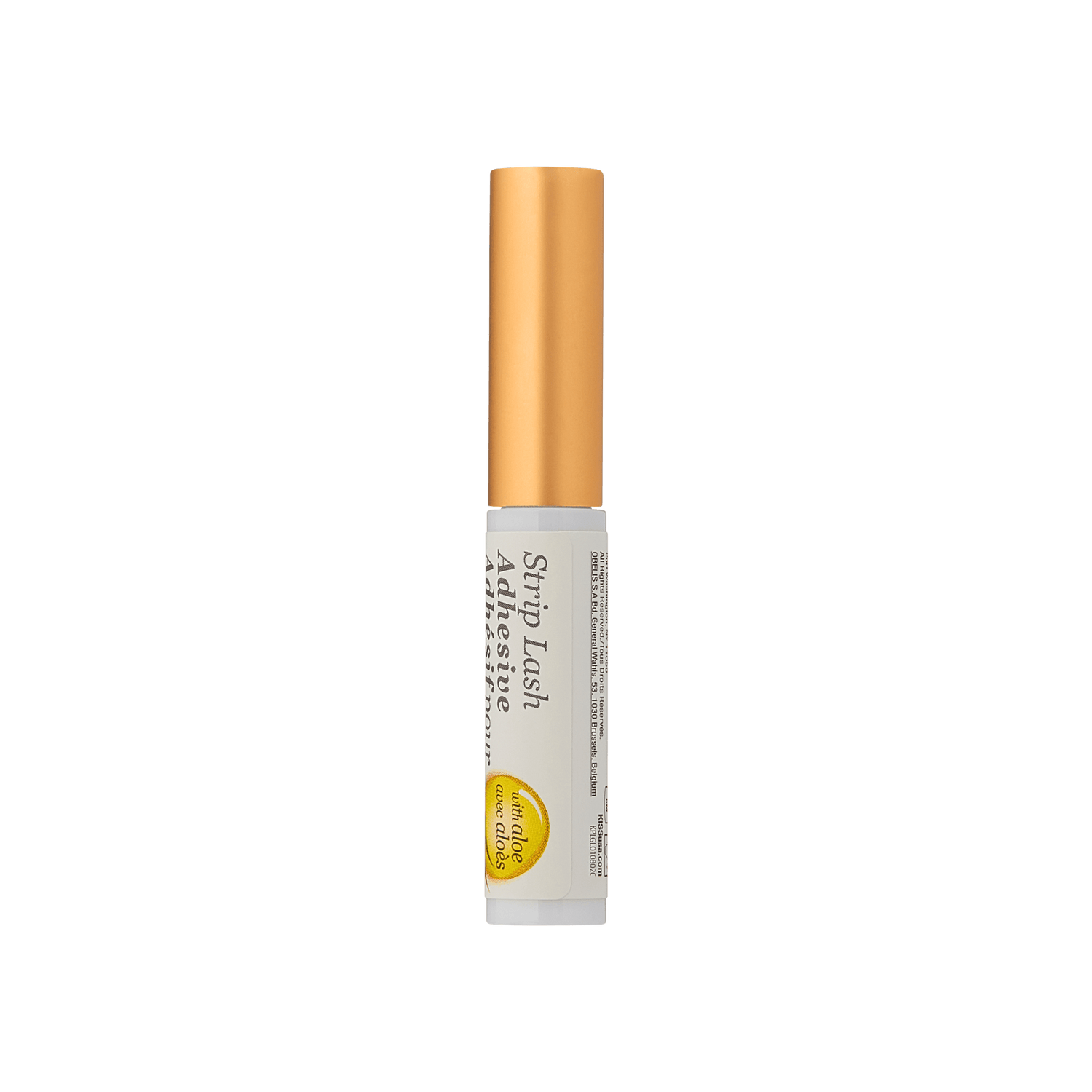 Strip lash adhesive tube with gold cap on a green background
