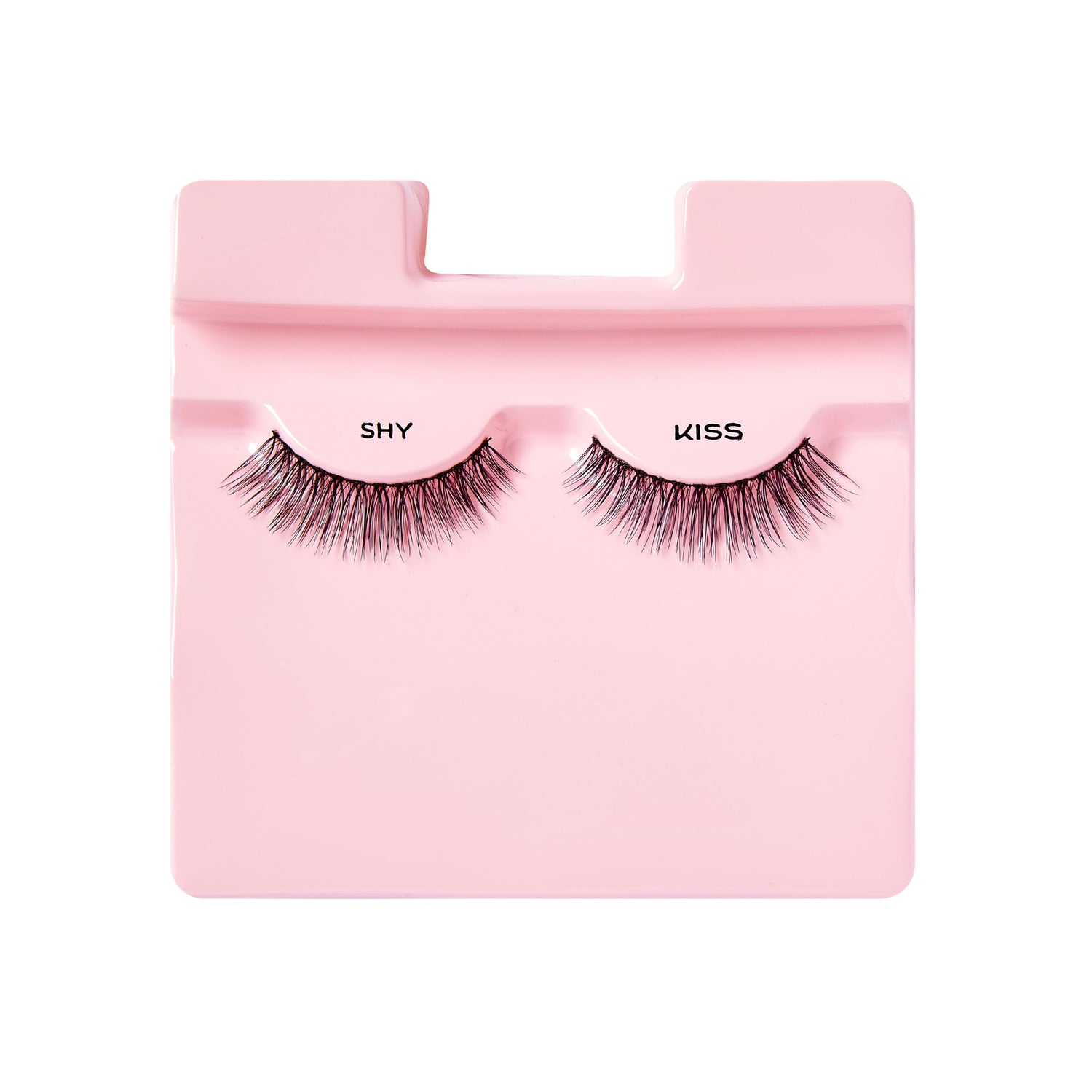 Pair of black false eyelashes with a natural style, displayed on a light pink plastic tray labeled \