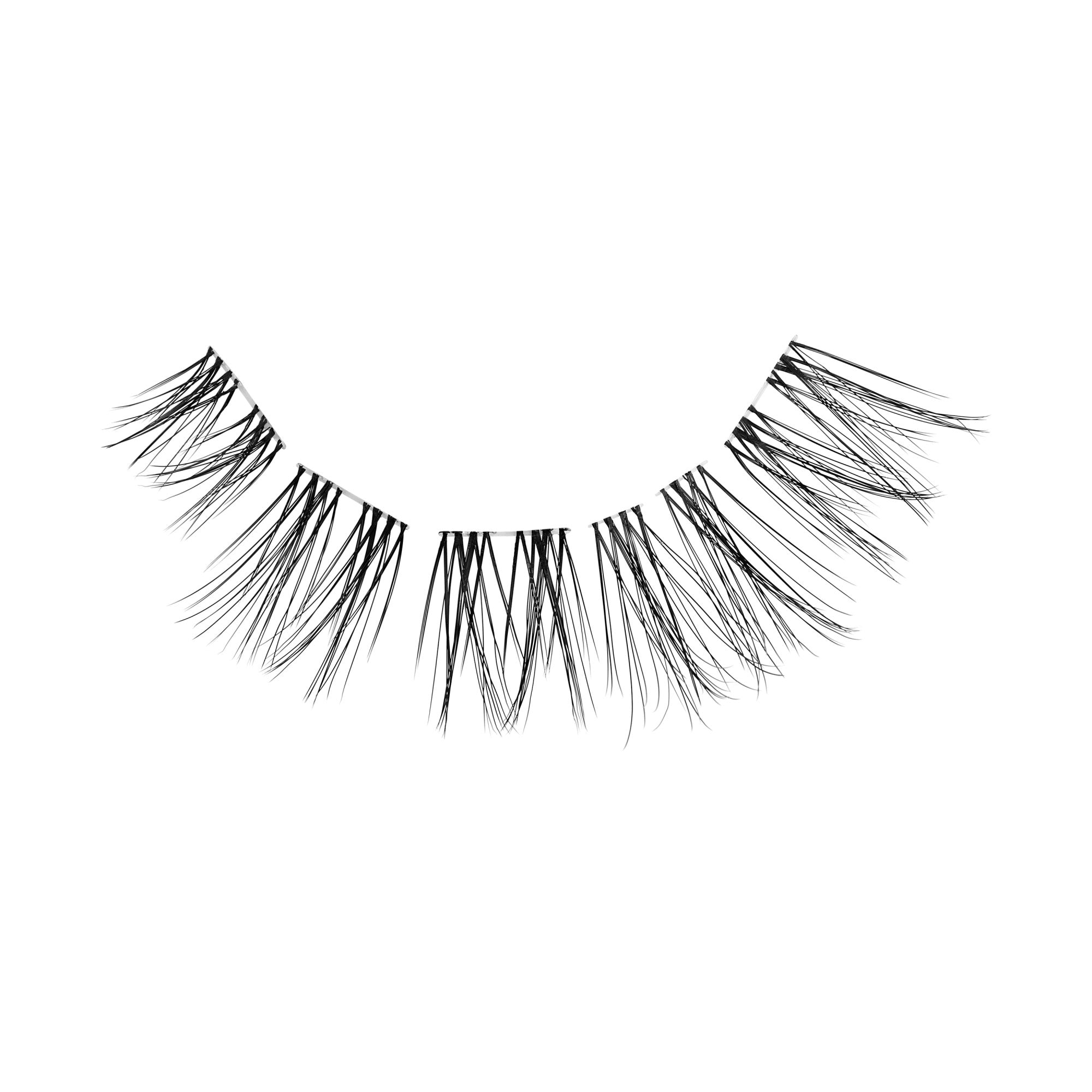 Pair of black false eyelashes with dramatic, layered lash fibers on white background.