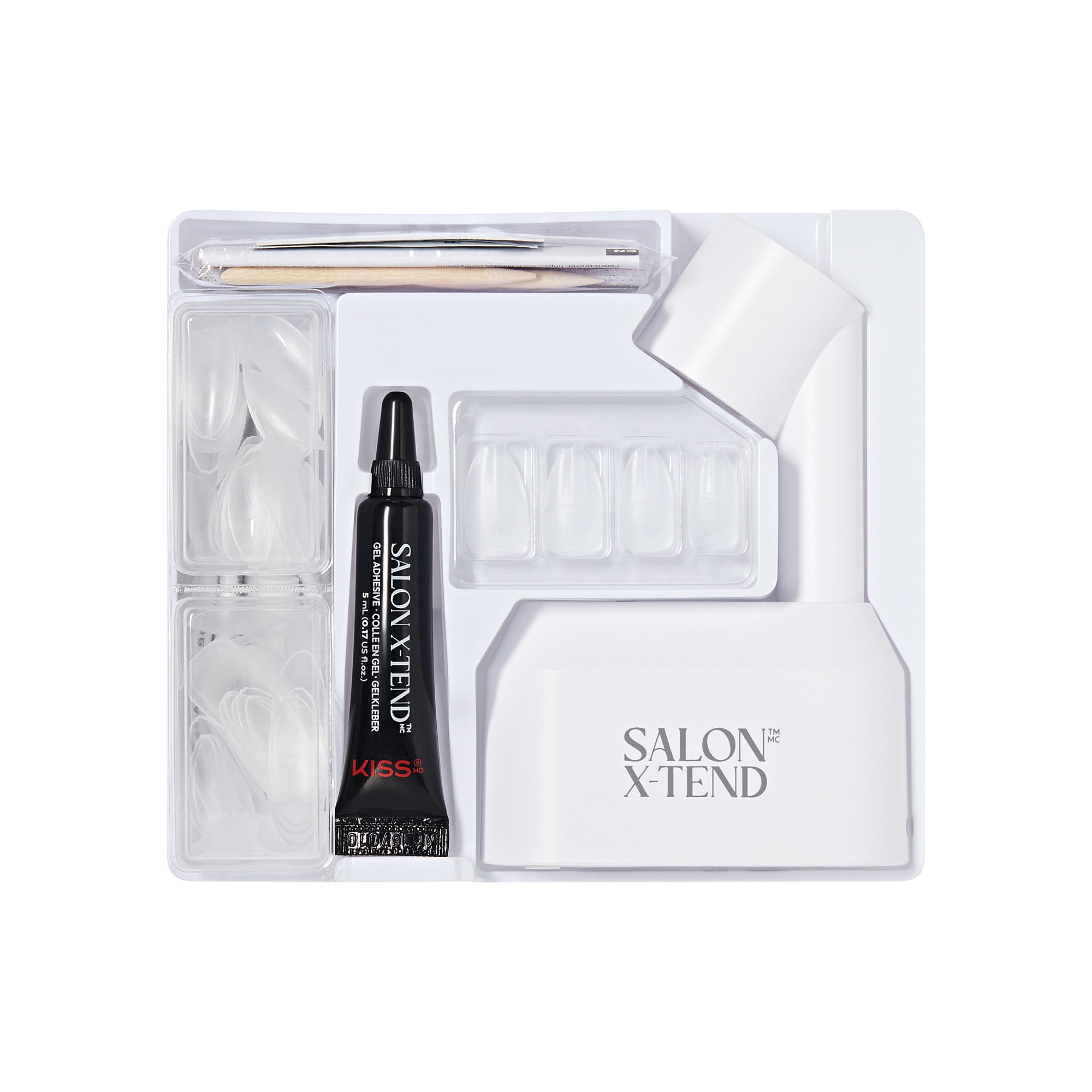 Salon X-Tend nail extension kit with brush, glue, nail tips, and applicator tools.