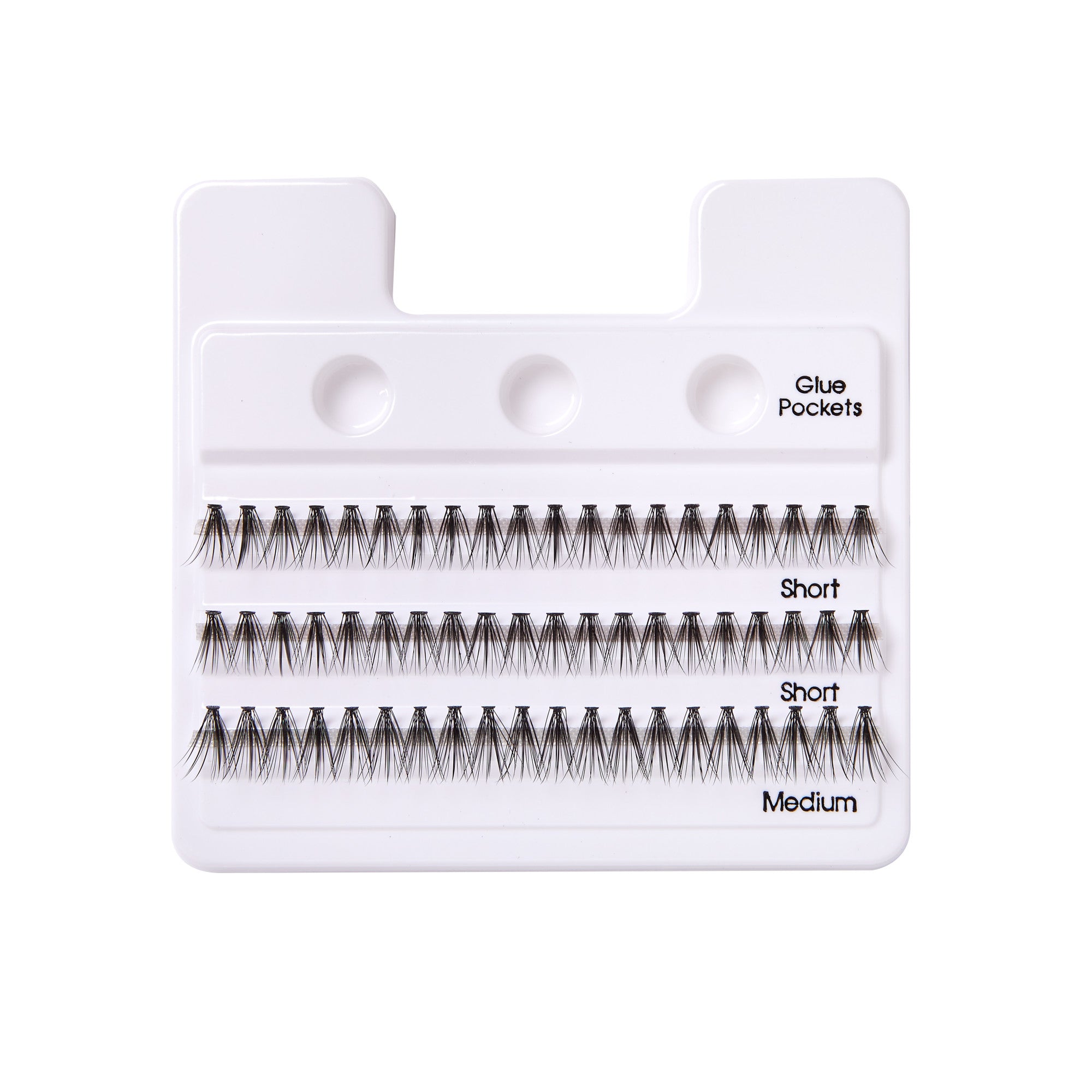 White plastic tray holding three rows of black faux lash extensions labeled as \