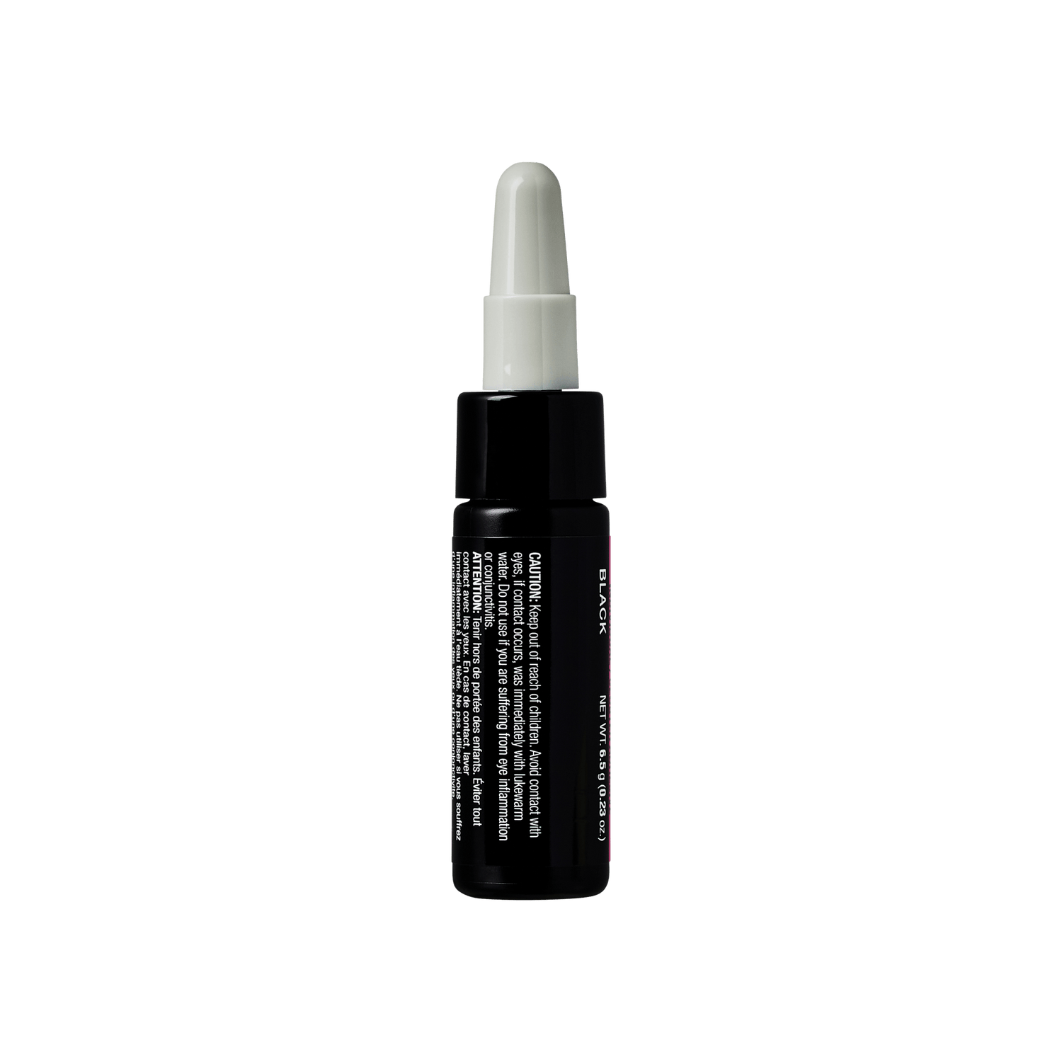 Black dropper bottle with white cap and product information label on dark background