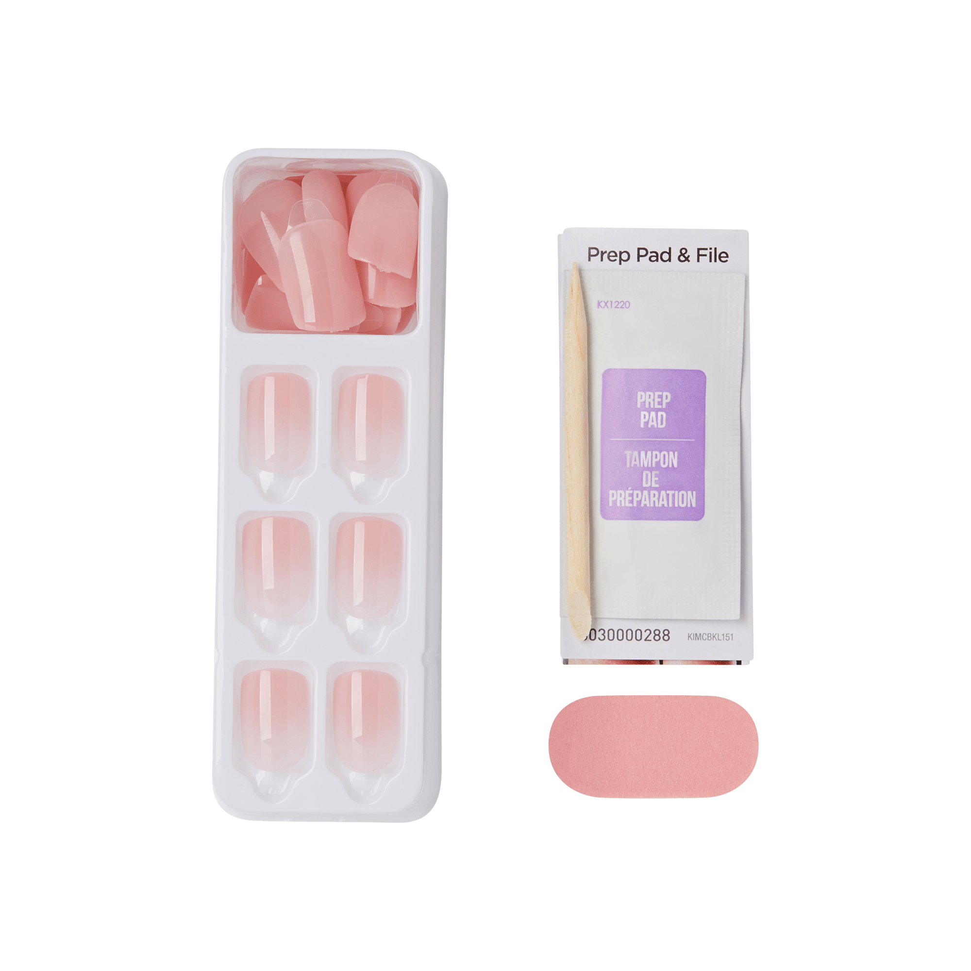 Tray of soft pink press-on nails in two sizes, alongside a wooden cuticle stick, a lavender-labeled prep pad, and a pink nail file, for nail application prep.