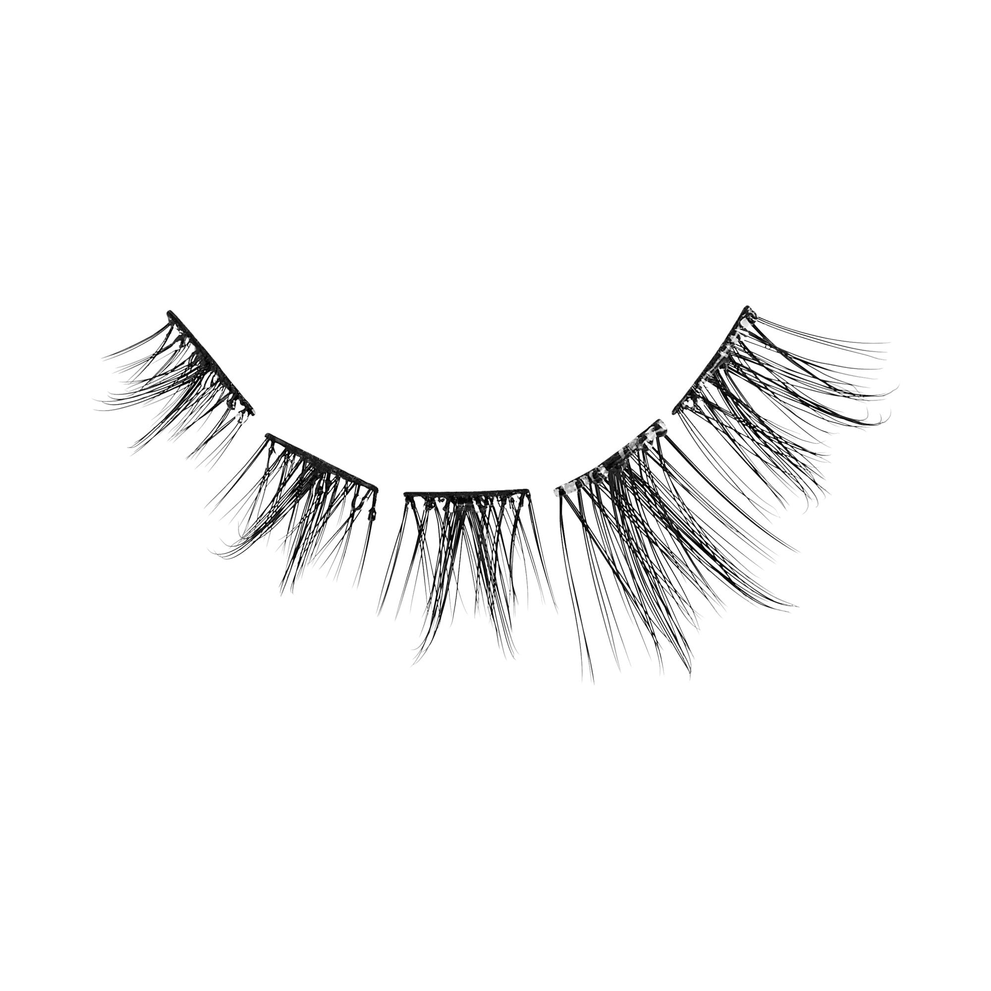 Pair of black false eyelashes with layered fibers on white background.